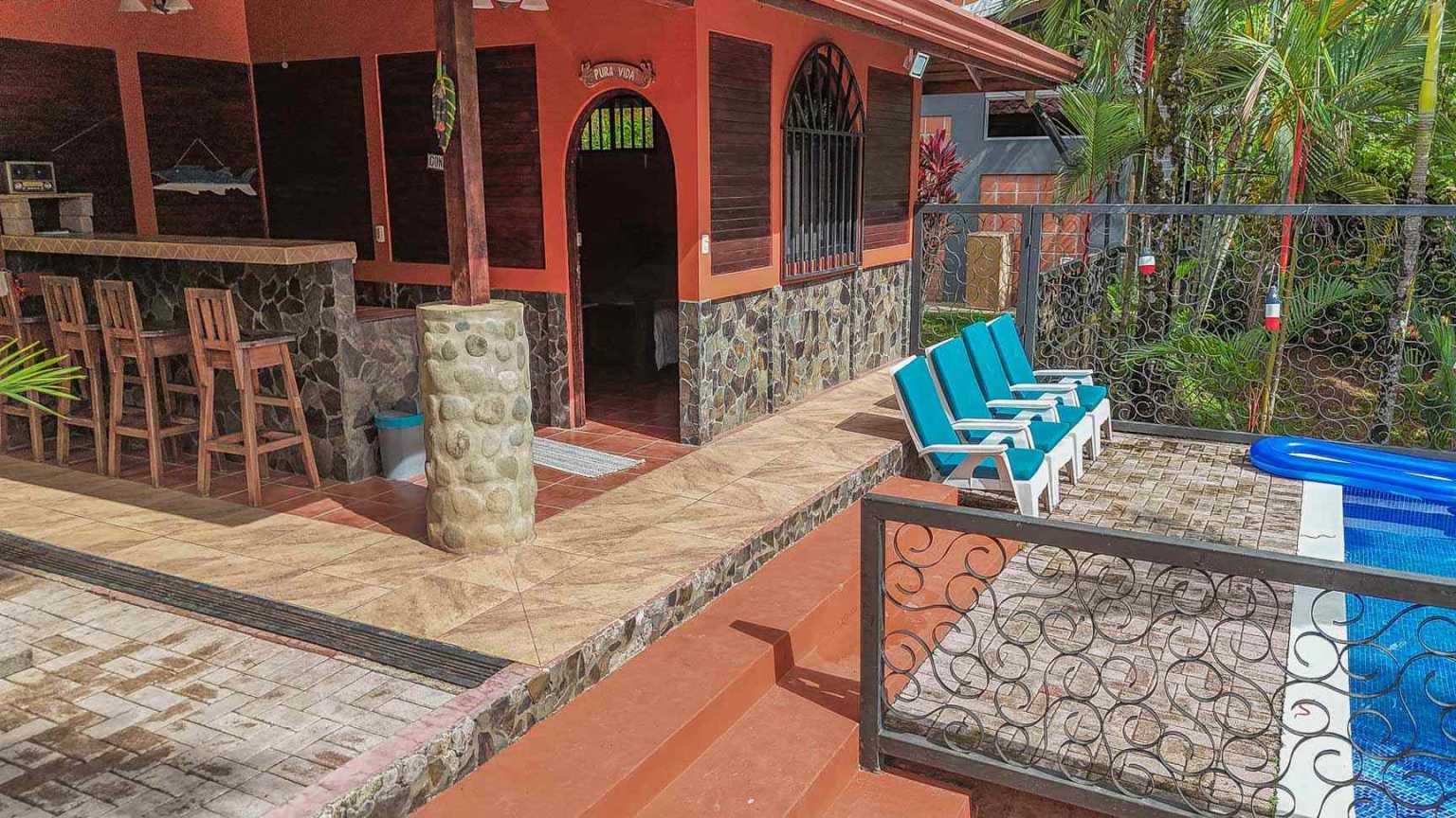 42517 (46) Beautiful Half-Acre Property in the Heart of Ojochal with Mountain Views, Traditional Homes, Pool, Lush Mature Gardens Priced to Sell in Ojochal Costa Rica