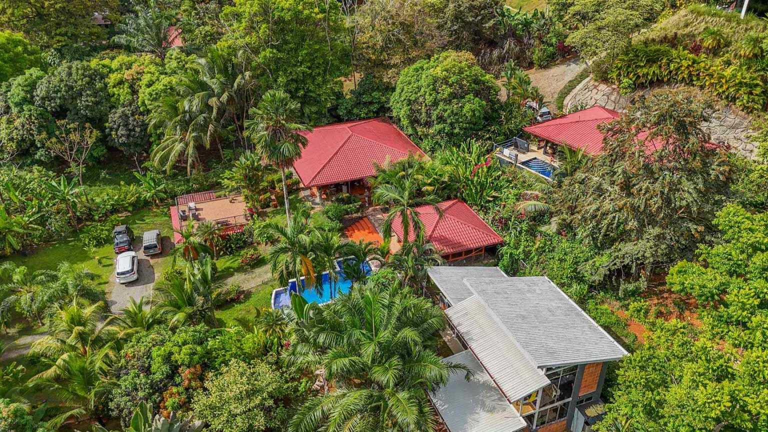 42517 (31) Beautiful Half-Acre Property in the Heart of Ojochal with Mountain Views, Traditional Homes, Pool, Lush Mature Gardens Priced to Sell in Ojochal Costa Rica
