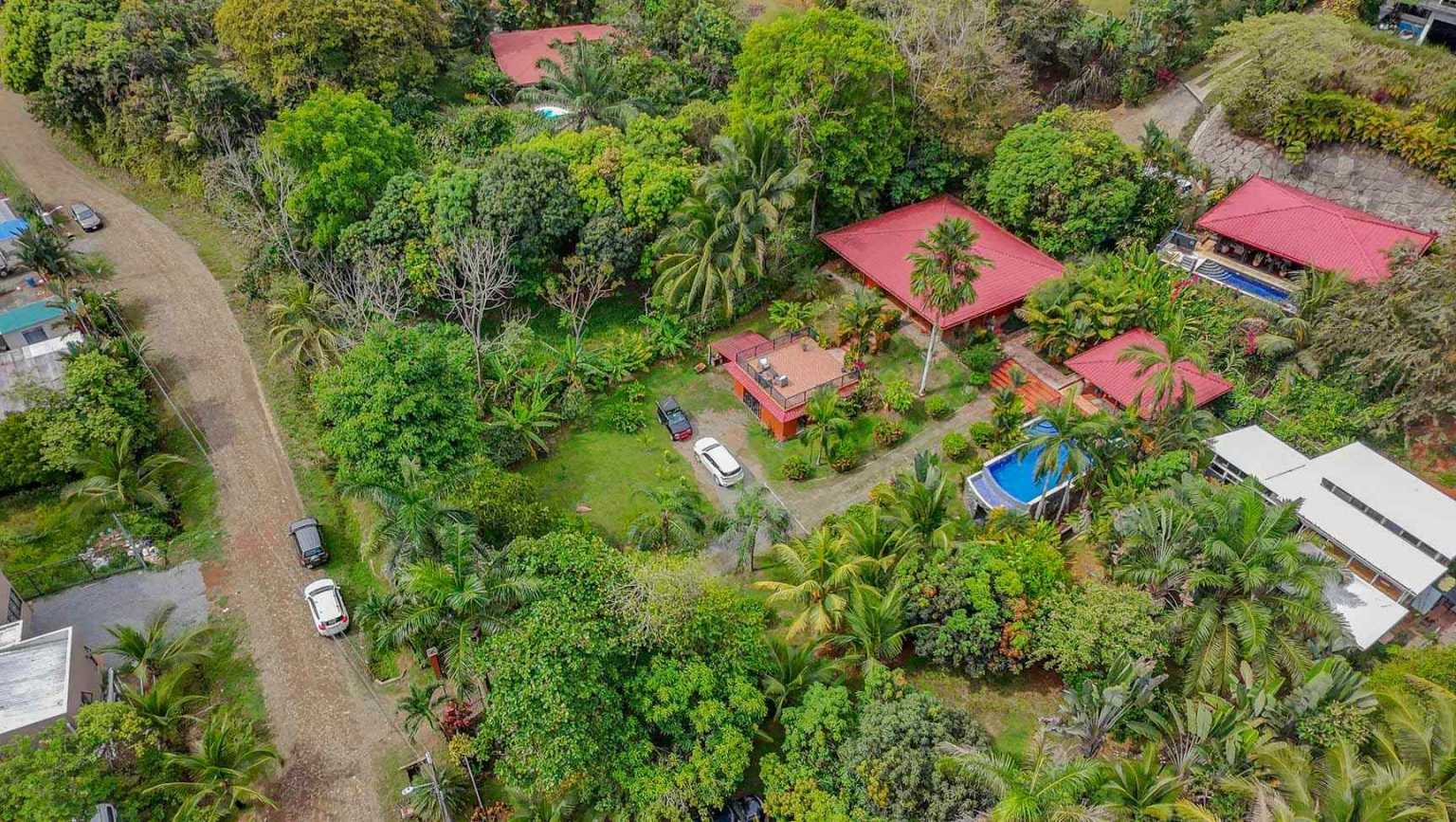 42517 (33) Beautiful Half-Acre Property in the Heart of Ojochal with Mountain Views, Traditional Homes, Pool, Lush Mature Gardens Priced to Sell in Ojochal Costa Rica