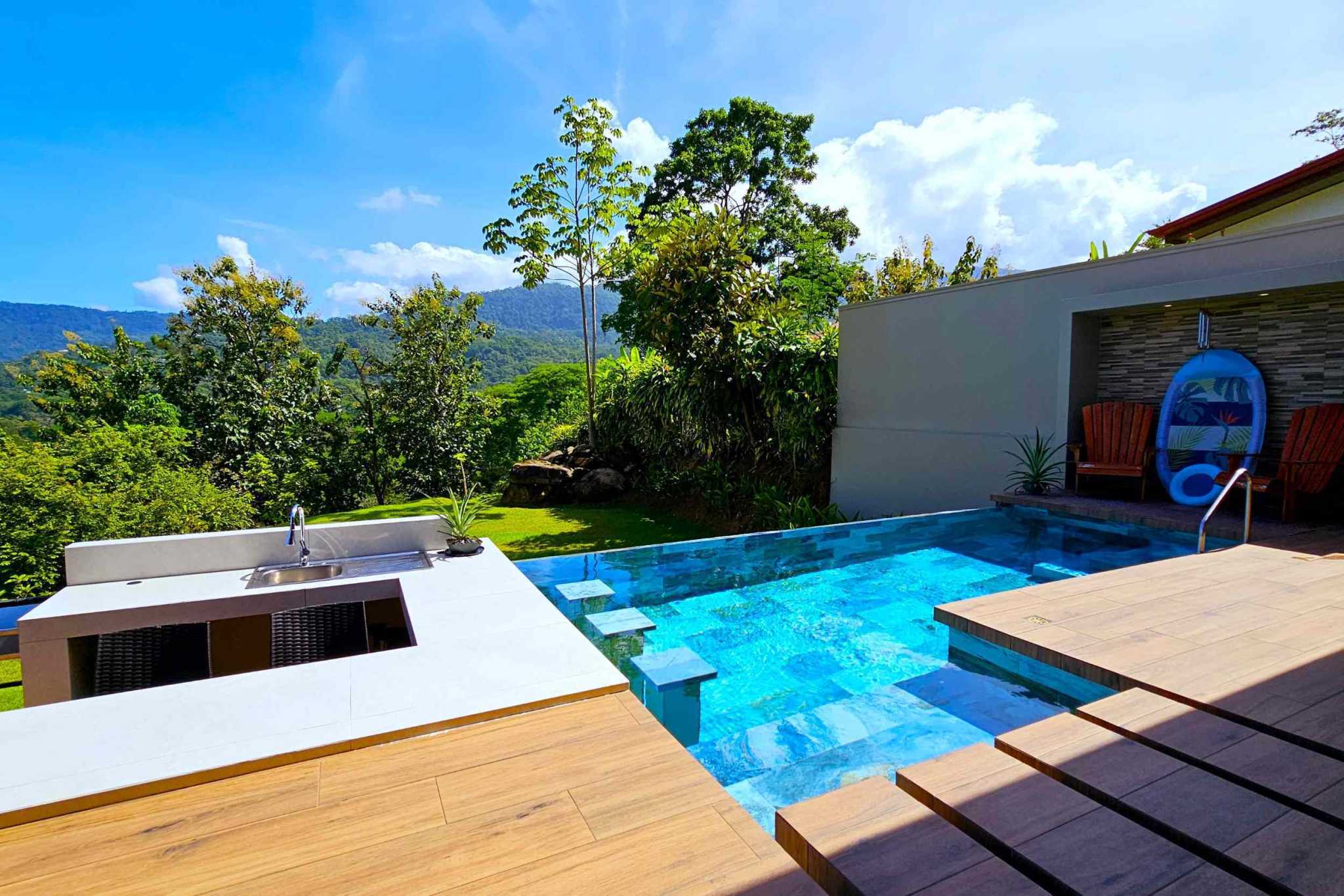43861 (15) Elegant New 2-Bedroom Home with 2 Extra Building Pads + Mountain Views with Pool on La Union Road in Uvita Costa Rica