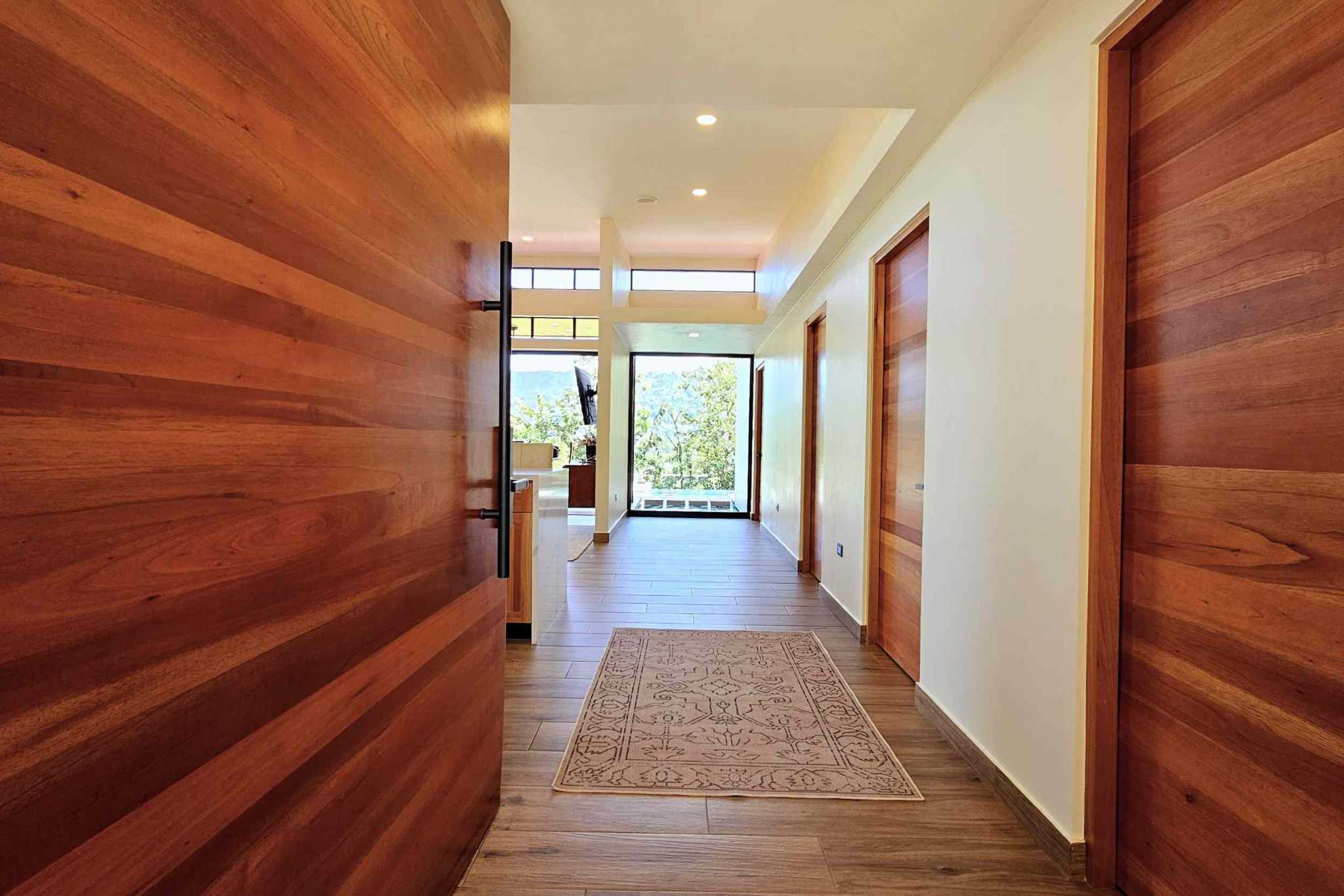 43861 (50) Elegant New 2-Bedroom Home with 2 Extra Building Pads + Mountain Views with Pool on La Union Road in Uvita Costa Rica