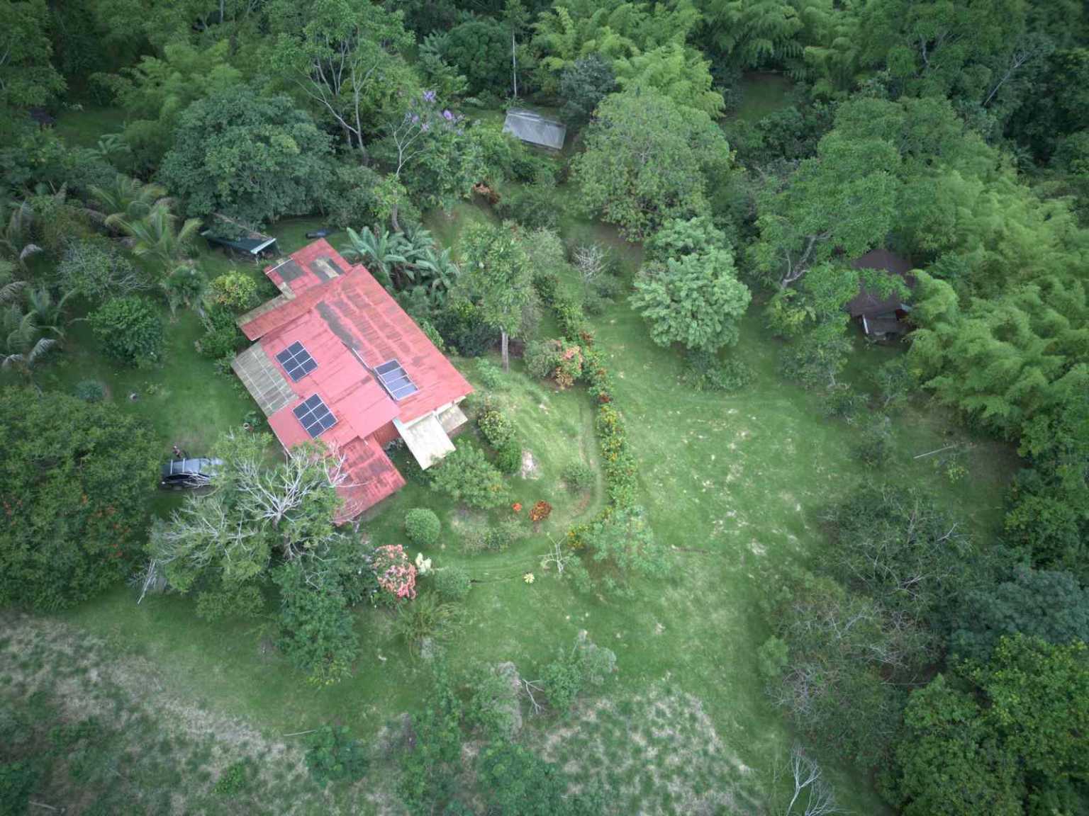 47892 (48) Off-Grid 2-Bedroom Home Plus 2 Guest Cabins, Fruit Trees, River Access, Mountain Views & Small Ocean View on 5+ Acres in Tinamastes Costa Rica