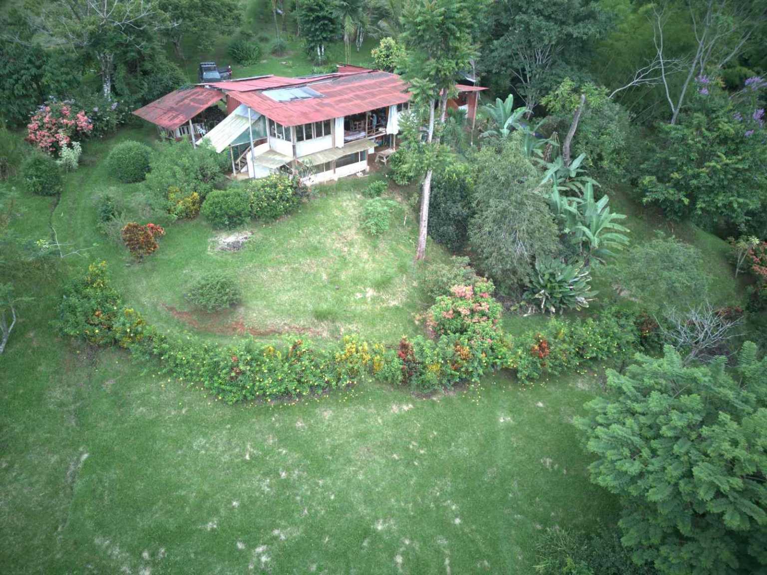47892 (16) Off-Grid 2-Bedroom Home Plus 2 Guest Cabins, Fruit Trees, River Access, Mountain Views & Small Ocean View on 5+ Acres in Tinamastes Costa Rica