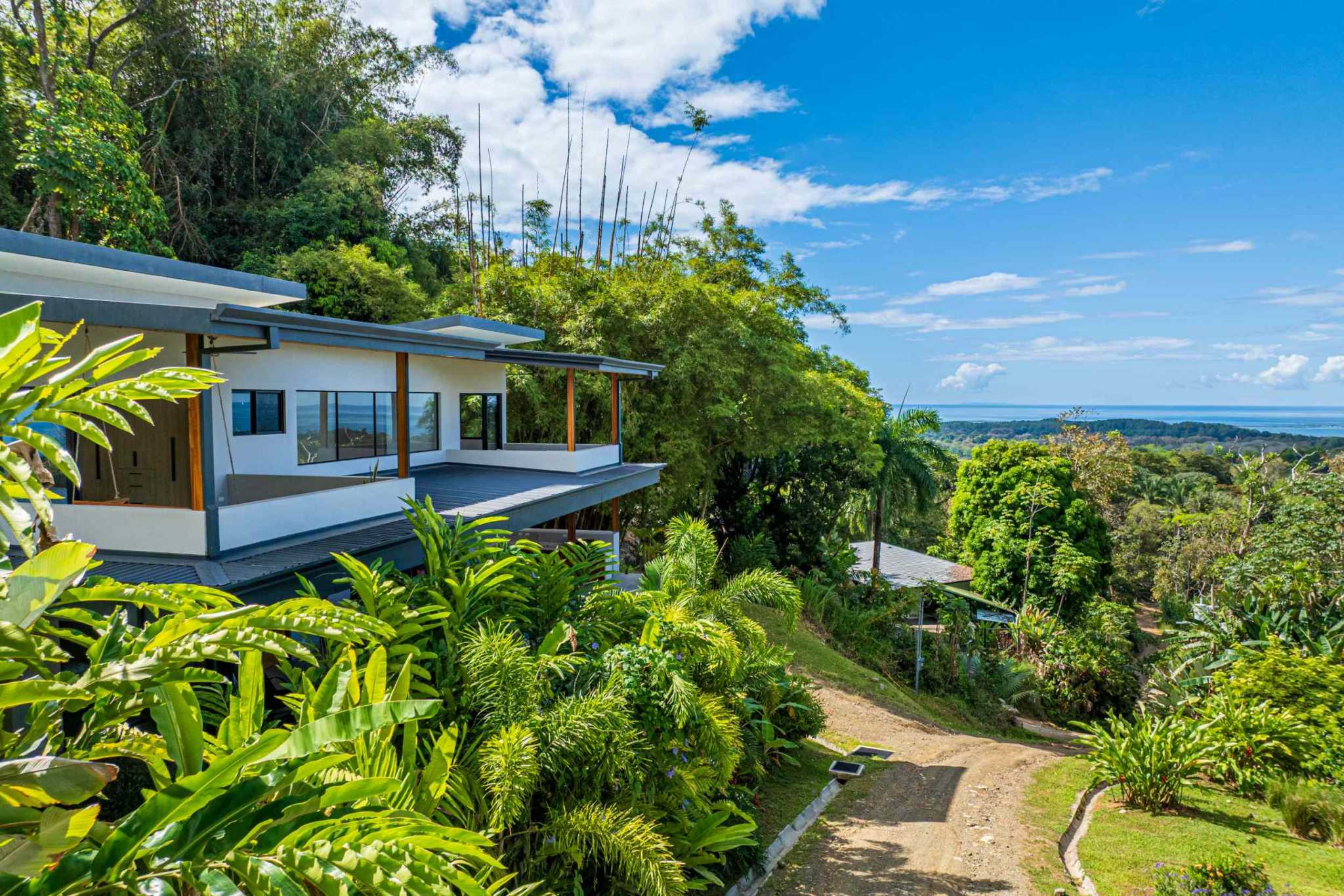 48280 (10) Brand-New Designer 3-Bedroom Villa with Ocean Views & Sunset Balconies in Uvita Costa Rica