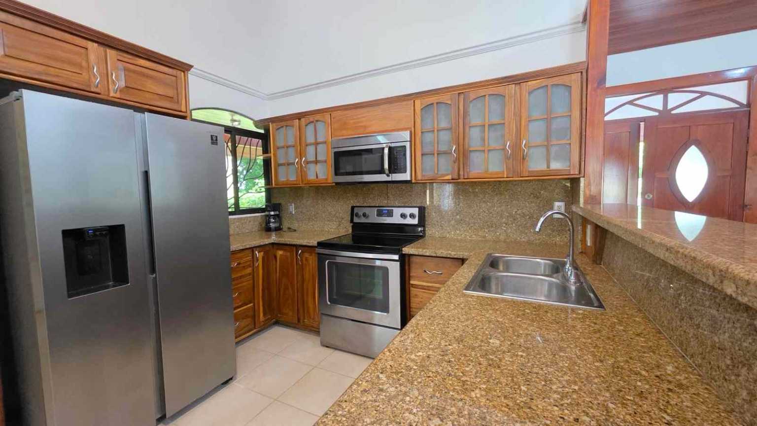 30753 (7) Easy-Access Home with Beautiful Outdoor Living Space, Pool & Garden in Ojochal Costa Rica