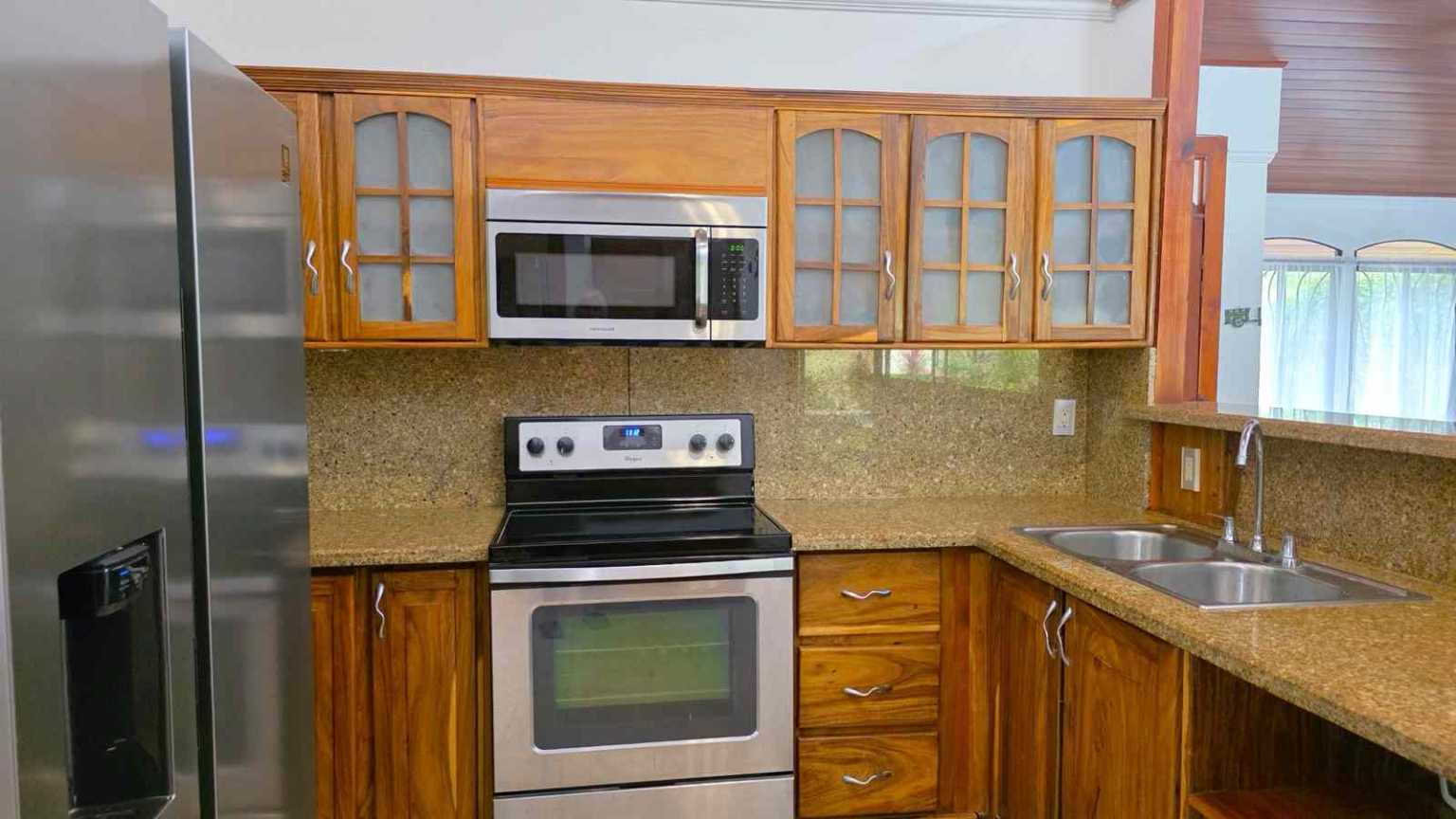 30753 (8) Easy-Access Home with Beautiful Outdoor Living Space, Pool & Garden in Ojochal Costa Rica