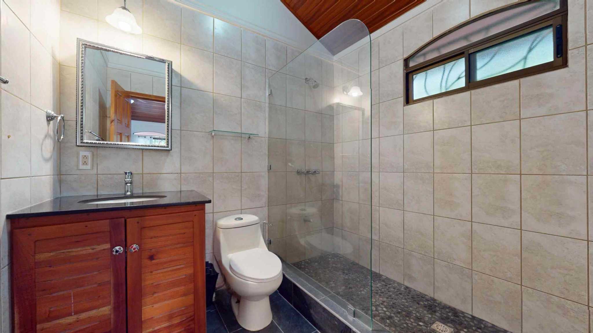 30753 (12) Easy-Access Home with Beautiful Outdoor Living Space, Pool & Garden in Ojochal Costa Rica