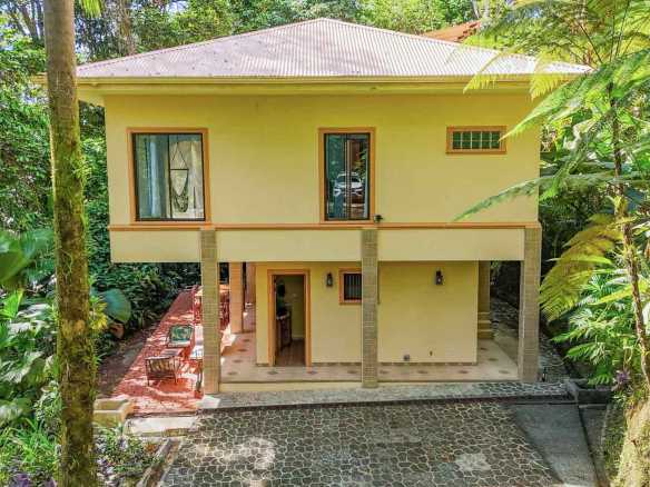 Stunning 3-Bedroom Rainforest Home with River & Waterfall on 3.5 Acres in Ojochal Costa Rica