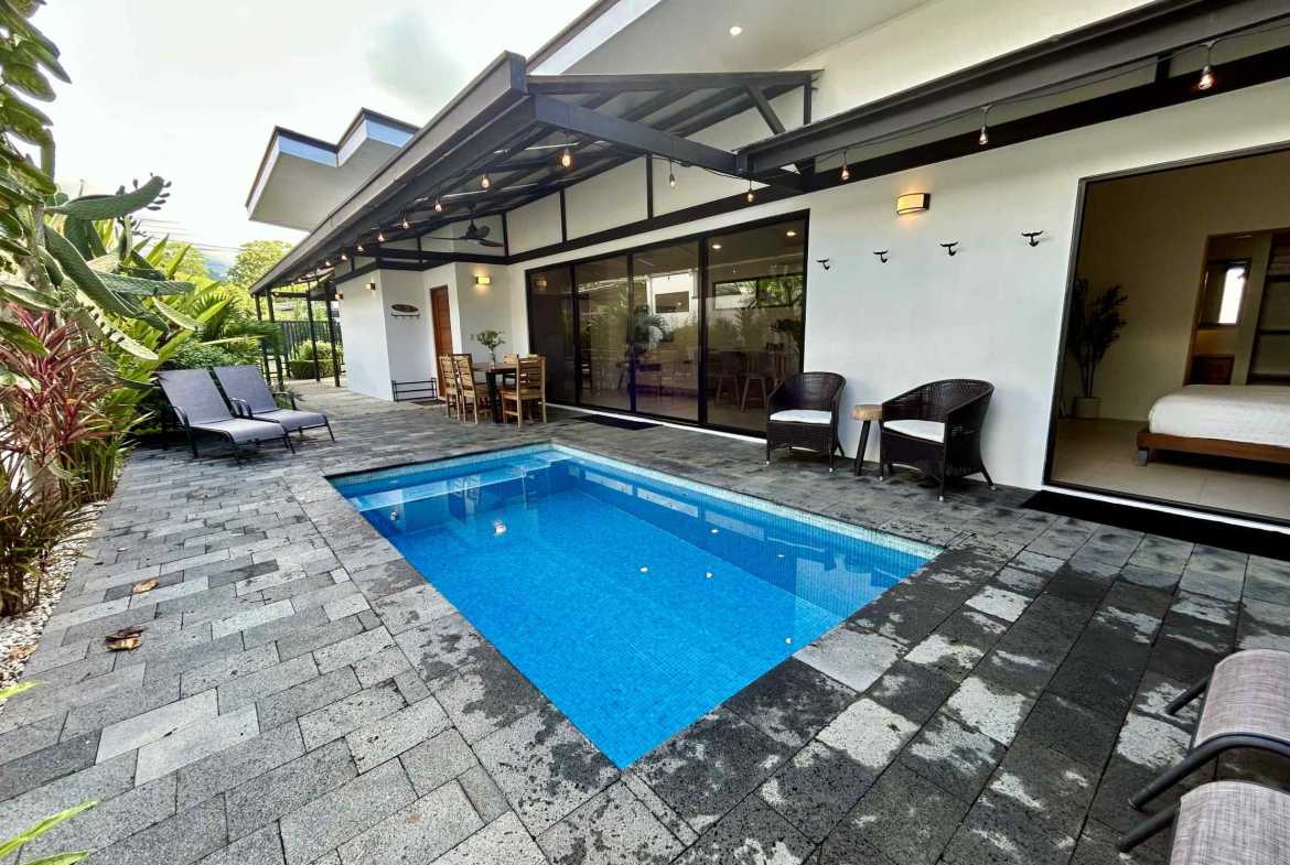 Modern 3-Bedroom Home with Private Pool & Walk-to-Beach, photo 1 of 24