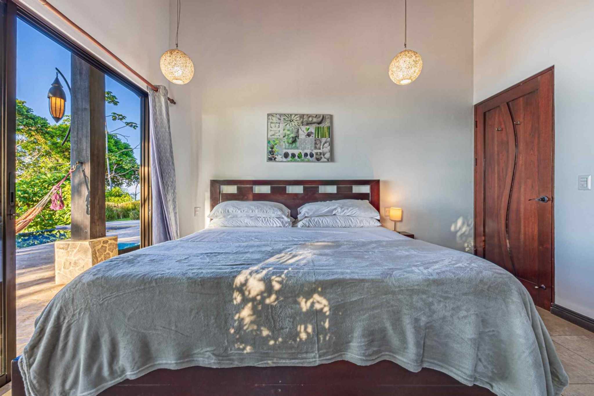 57464-12 Stunning 2-Bedroom Estate with Infinity Pool & Whale’s Tail Ocean Views in Dominical Costa Rica