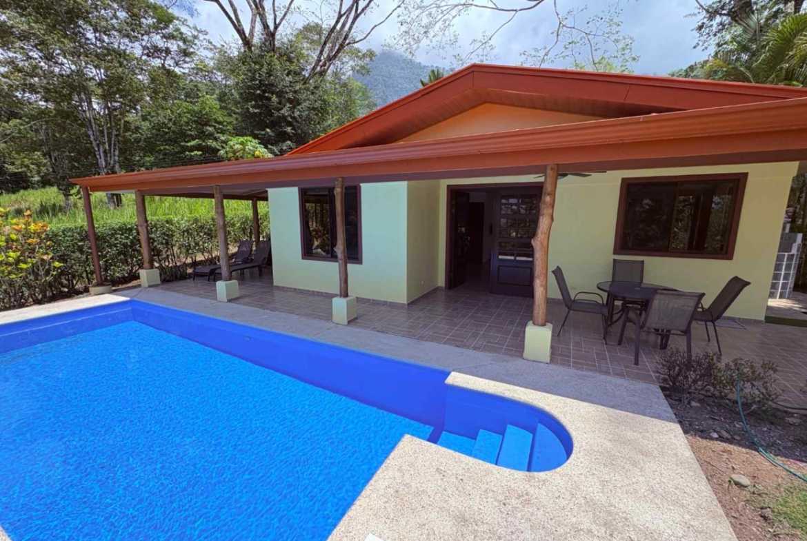 Move-in Ready 2 Bedroom Home with Window Ocean view & Pool in Ojochal Costa Rica