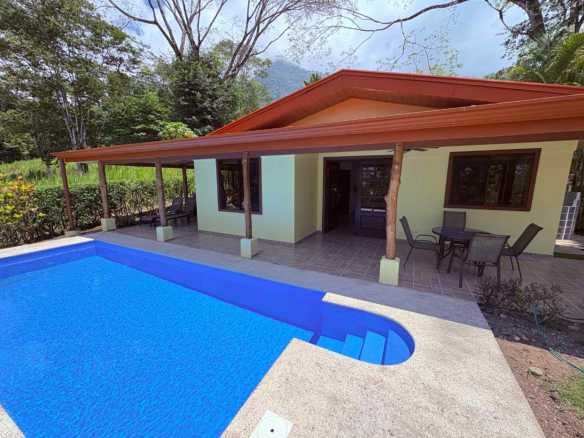 Move-in Ready 2 Bedroom Home with Window Ocean view & Pool in Ojochal Costa Rica