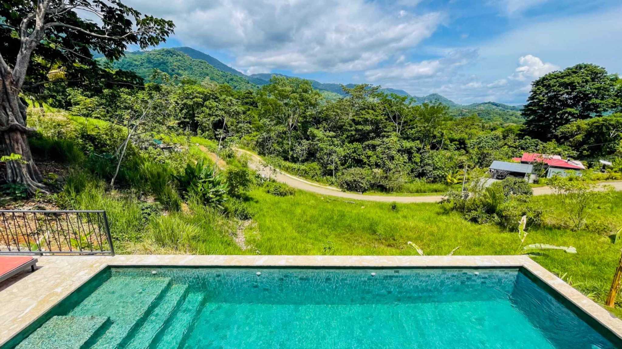 63089-6 Brand-New 4-Bedroom Home with Pool, Mountain Views & 24/7 Security in Ojochal Costa Rica