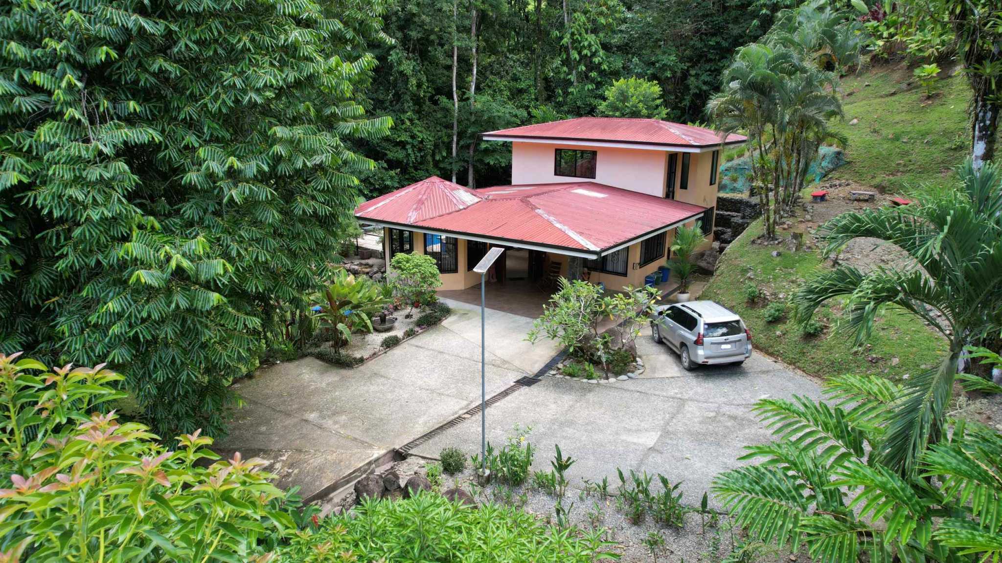 Spectacular 3-Bedroom Jungle Retreat with Private Waterfall in Ojochal Costa Rica