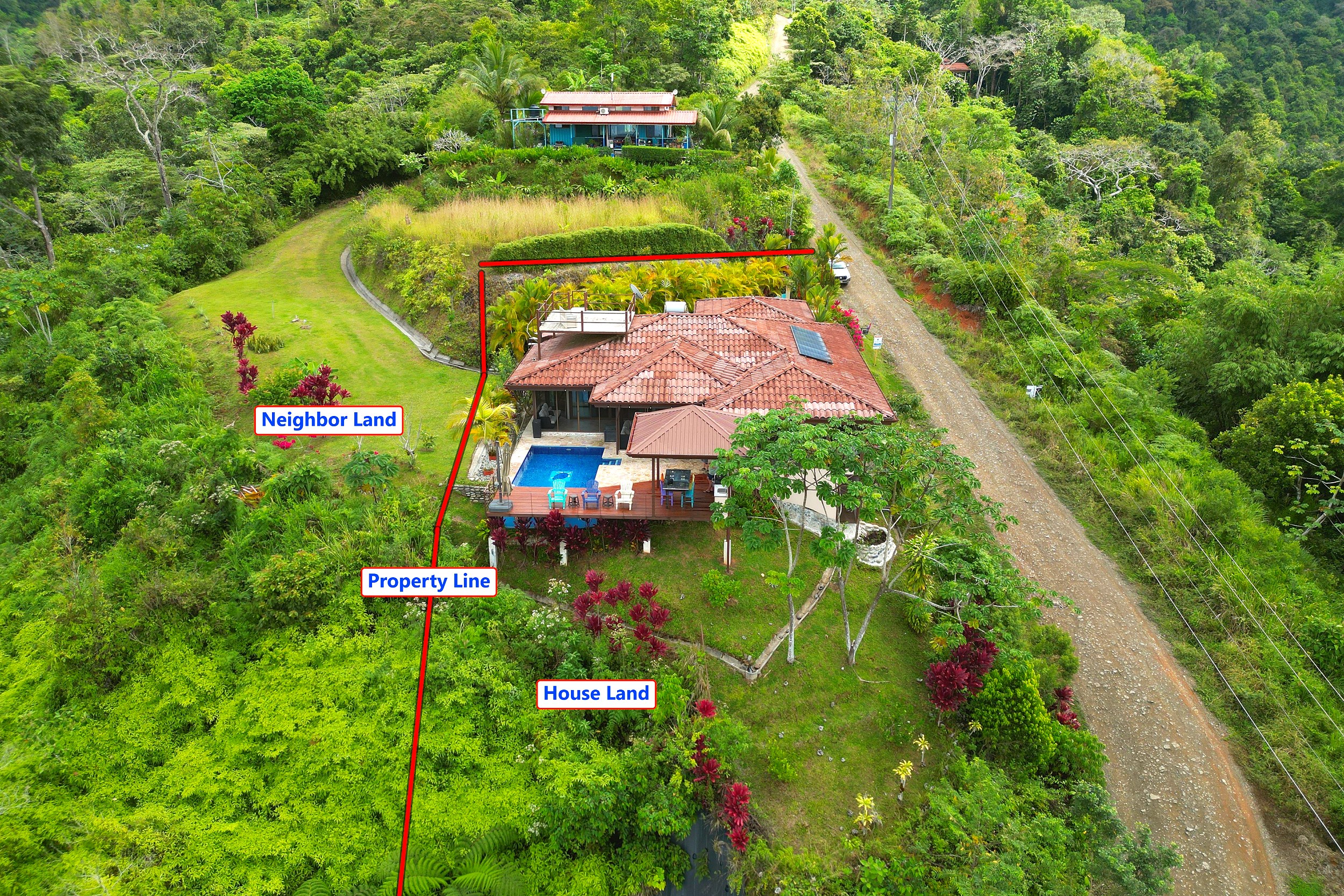 Aerial property line view of the villa and pool in Toucan Valley/Osa Mountain Village, Costa Rica.