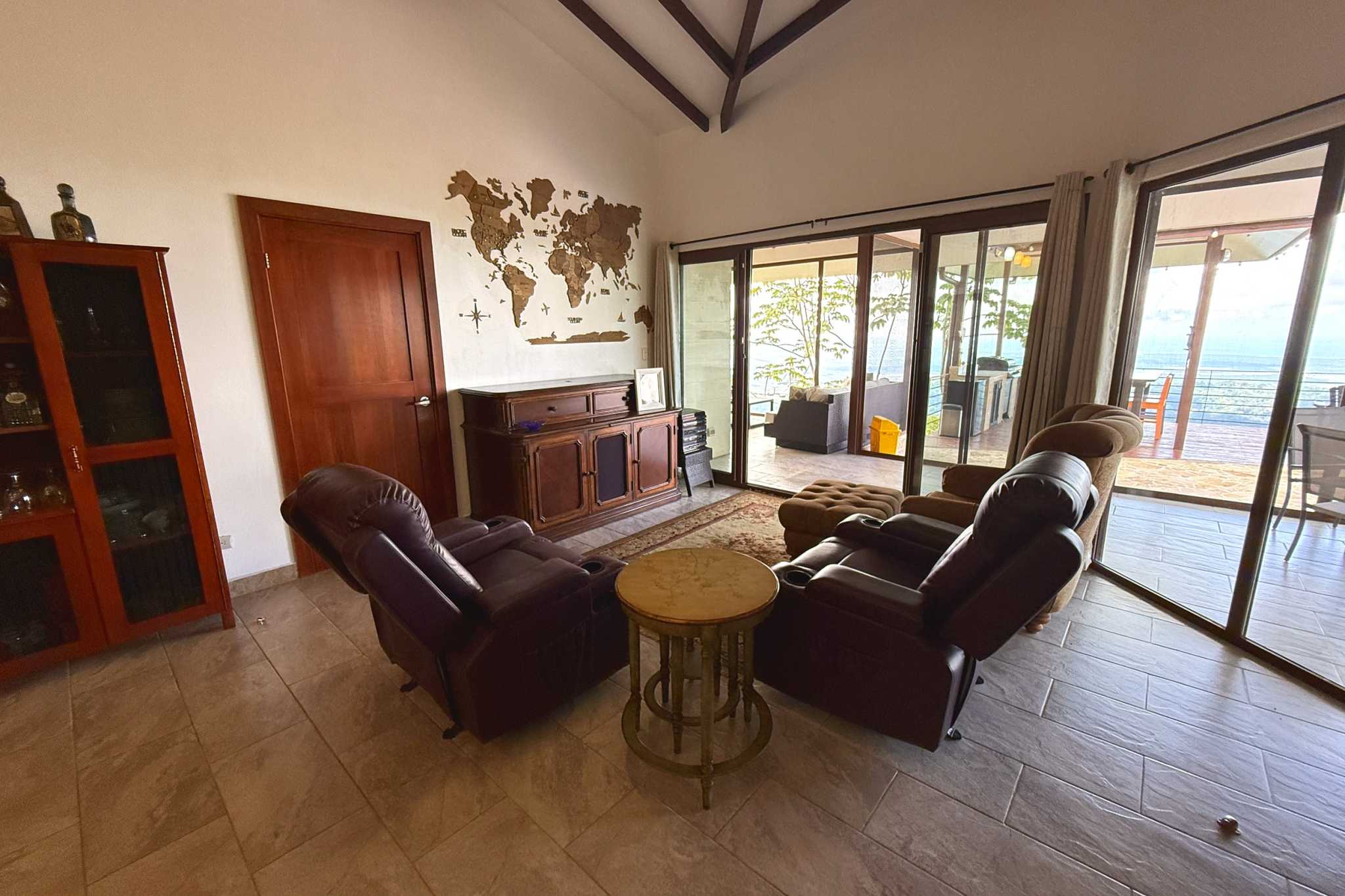 Spacious Living Room Ocean-View 3-Bedroom Home living room with recliners in Toucan Valley/Osa Mountain Village, Costa Rica