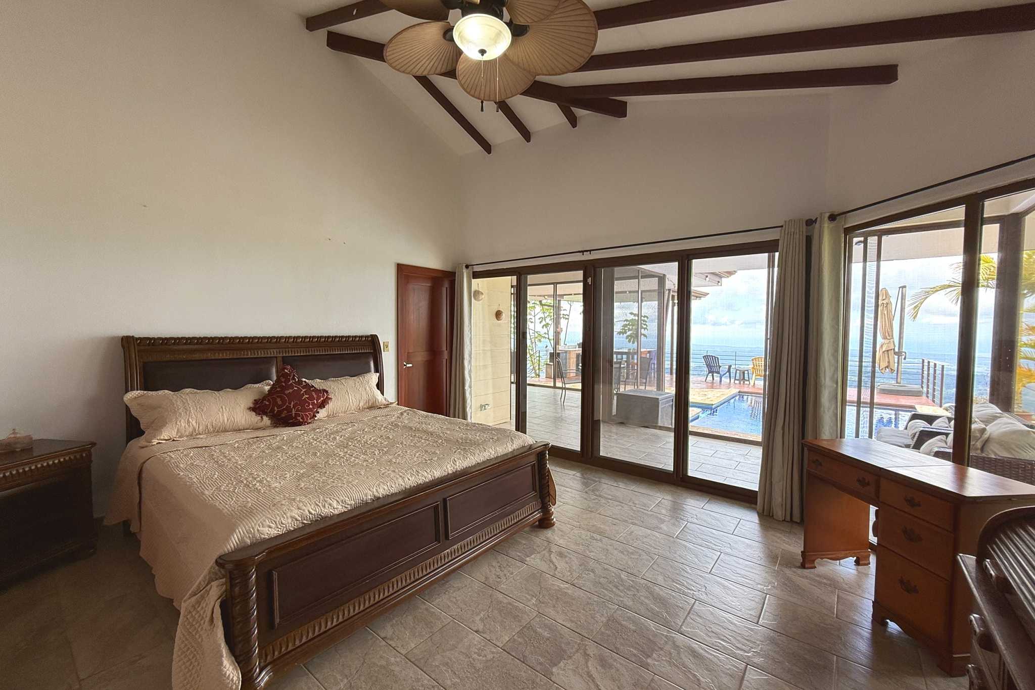Main Master Bedroom Ocean-View 3-Bedroom Home master bedroom with pool views in Toucan Valley/Osa Mountain Village, Costa Rica