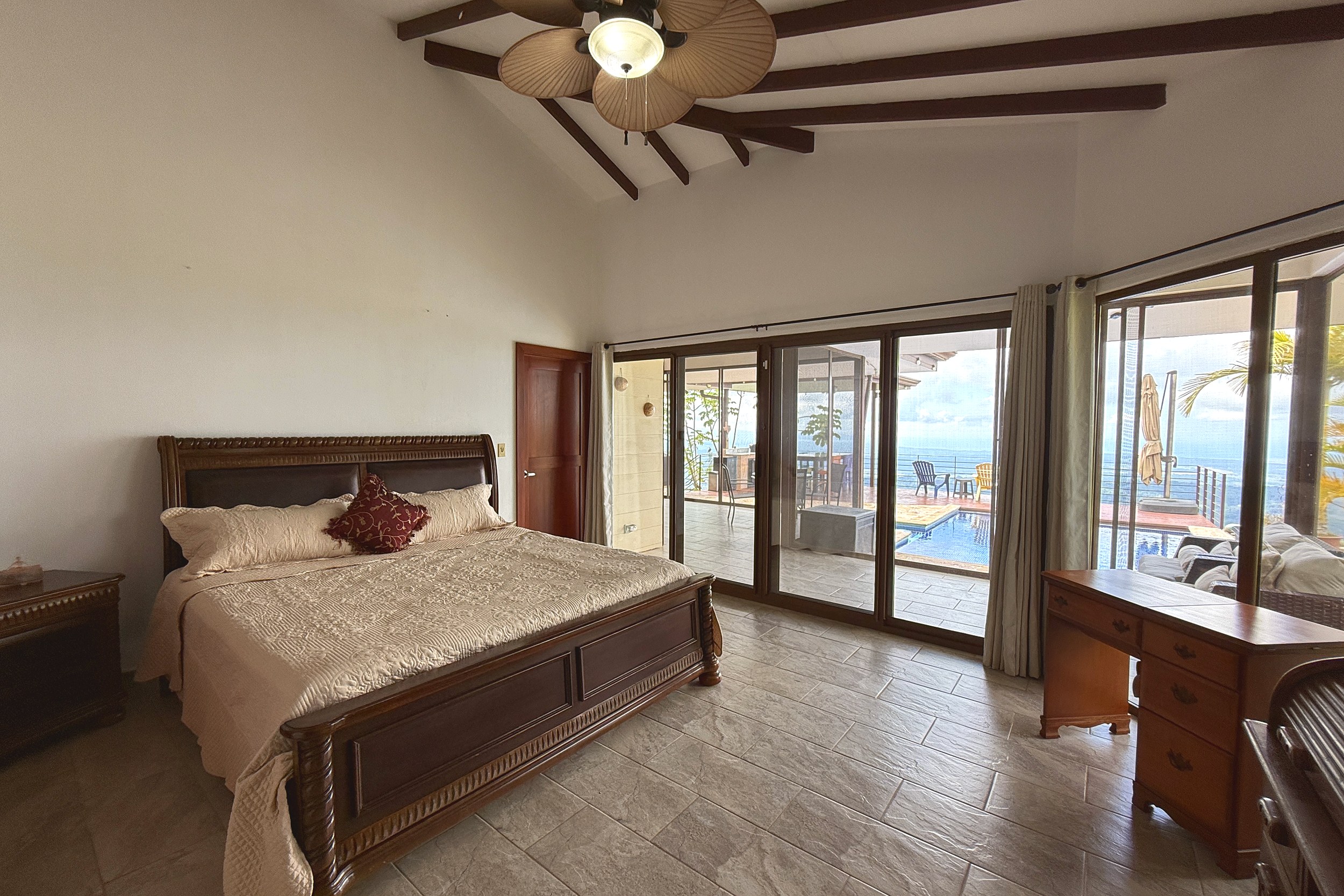 Ocean-View 3-Bedroom Home master bedroom with pool views in Toucan Valley/Osa Mountain Village, Costa Rica
