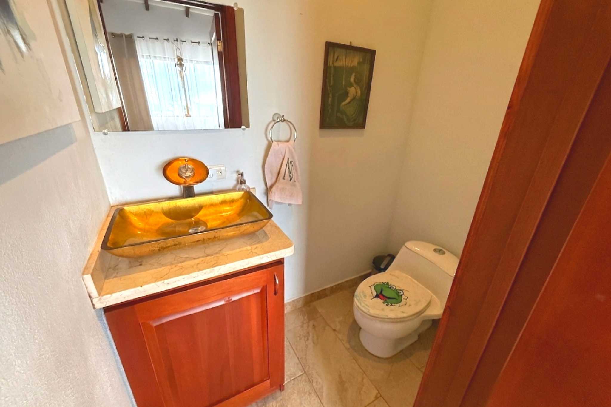 Main Guest Bathroom Ocean-View 3-Bedroom Home guest bathroom with gold sink in Toucan Valley/Osa Mountain Village, Costa Rica