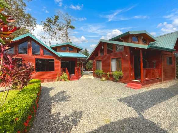 Unique Income Producing Home wooden cabins and gravel driveway in Bahia, Costa Rica