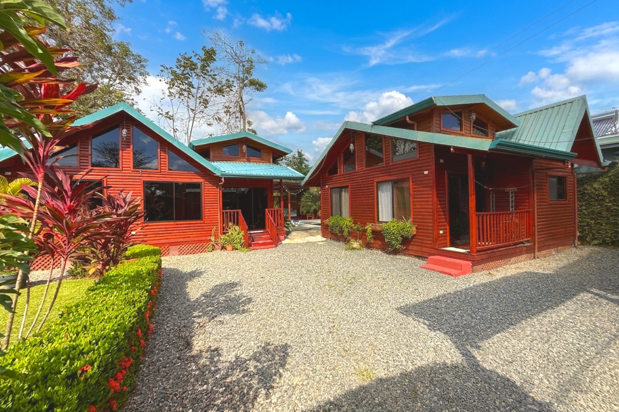 Unique Income Producing Home wooden cabins and gravel driveway in Bahia, Costa Rica
