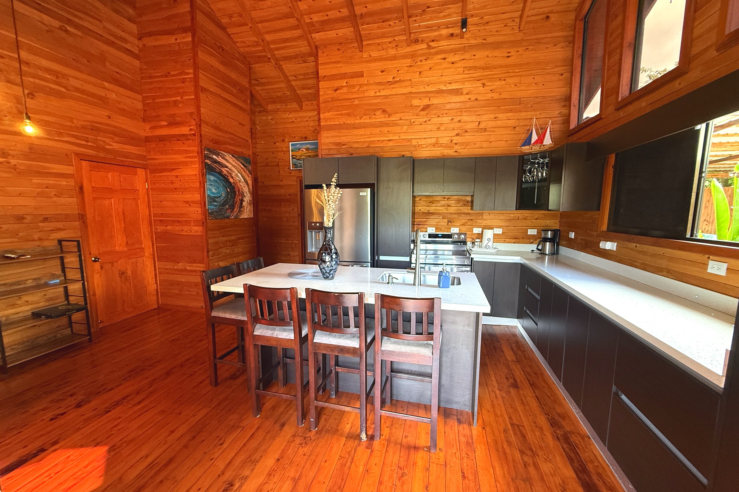 Modern Wood-Paneled Kitchen Unique Income Producing Home modern wood-paneled kitchen island in Bahia, Costa Rica