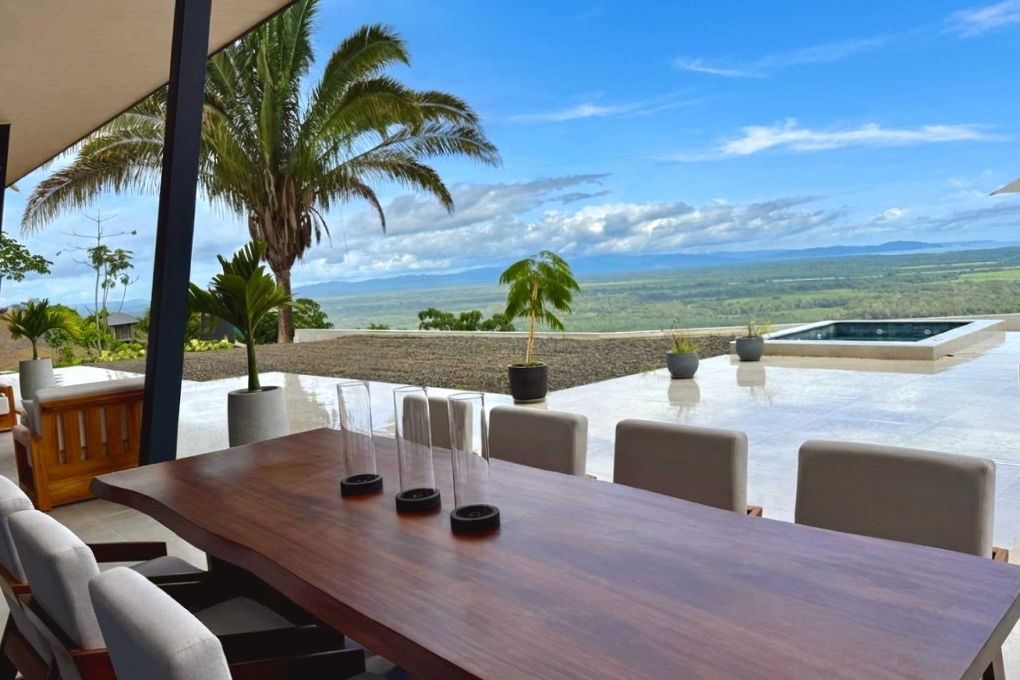 Terrace Dining & Ocean View Modern Luxury 4-Bedroom Home outdoor dining table and pool terrace in Chontales, Costa Rica