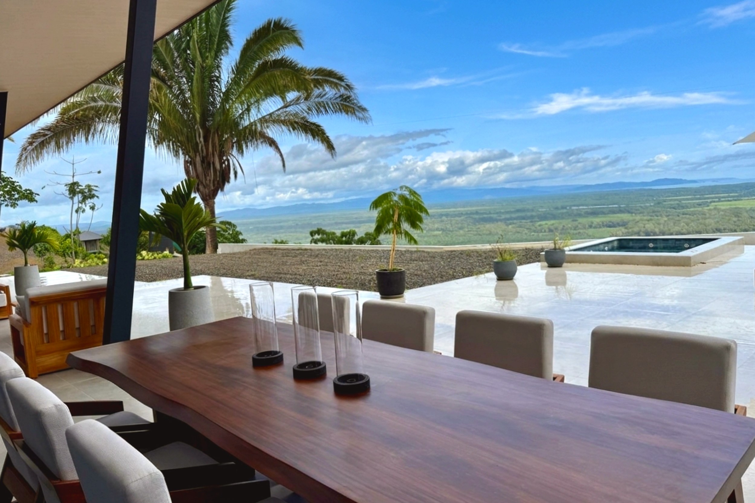 Modern Luxury 4-Bedroom Home outdoor dining table and pool terrace in Chontales, Costa Rica