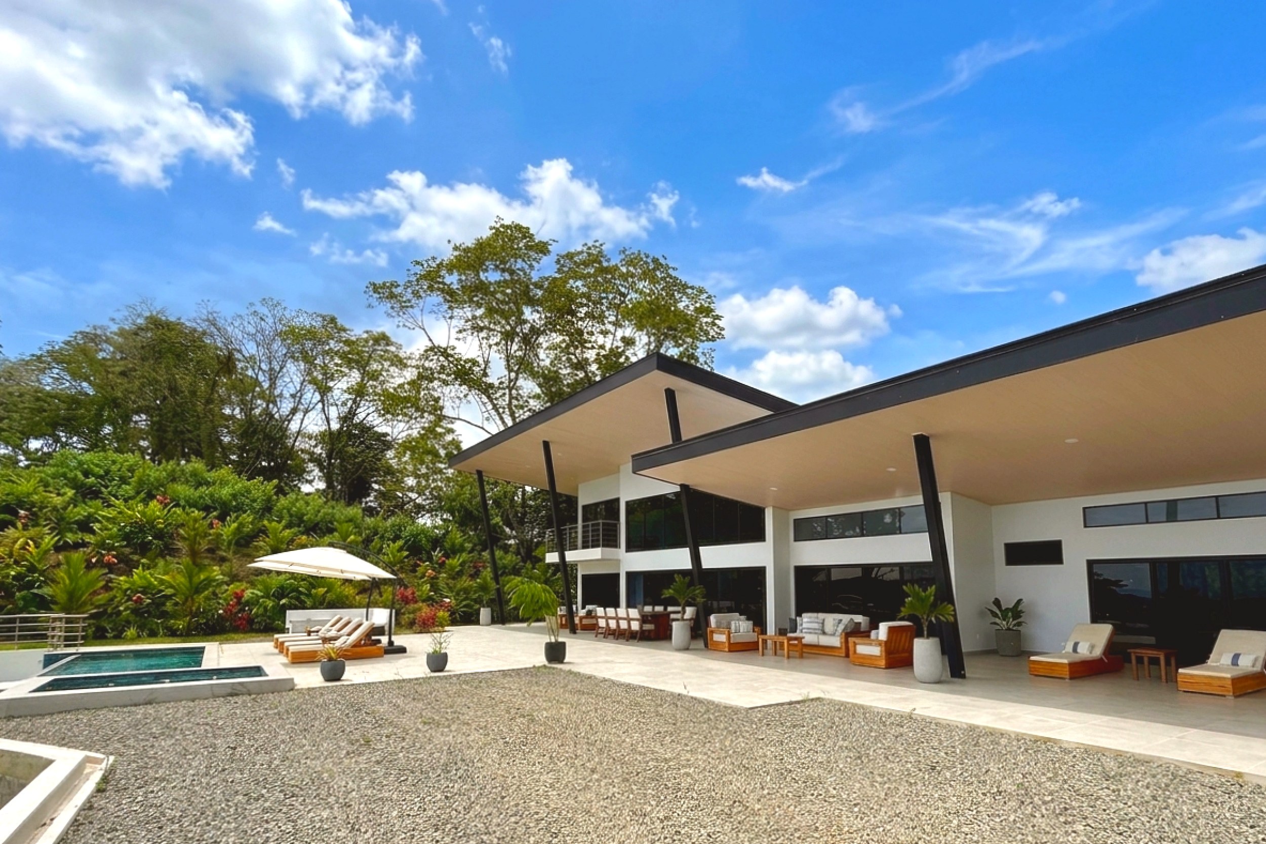Modern Luxury 4-Bedroom Home exterior patio and pool area in Chontales, Costa Rica.