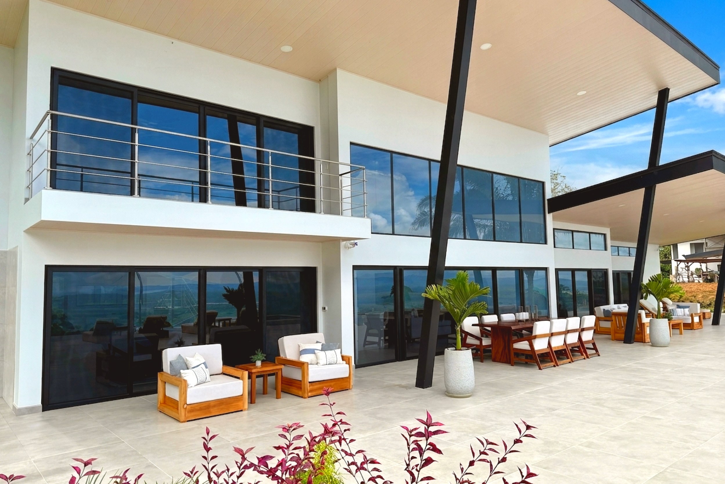 Modern Luxury 4-Bedroom Home exterior patio seating in Chontales, Costa Rica.