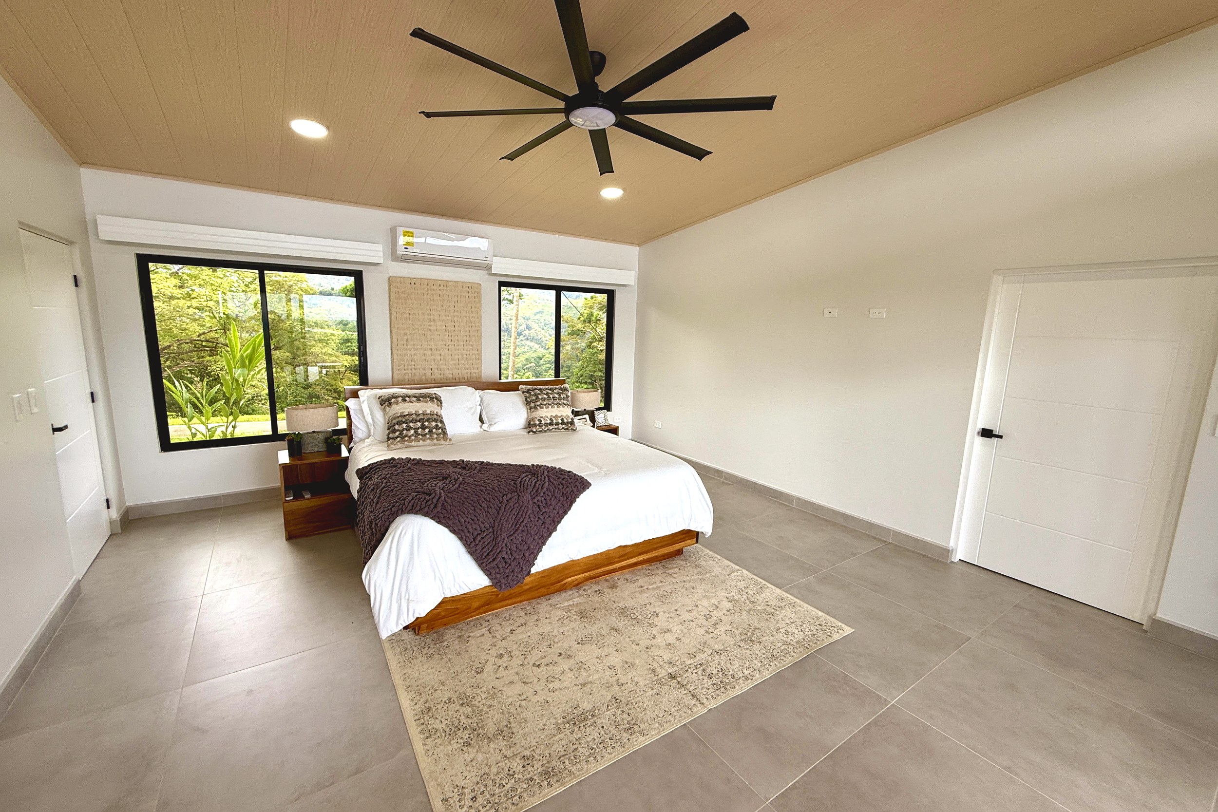 Modern Luxury 4-Bedroom Home master bedroom with wood ceiling in Chontales, Costa Rica