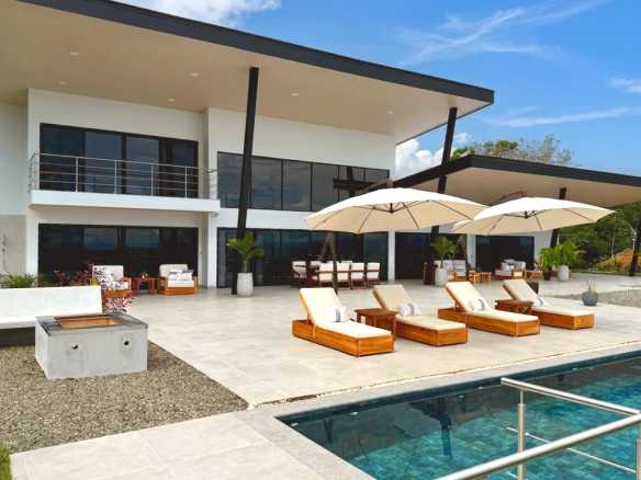 Modern Luxury Villa pool patio and loungers in Costa Rica