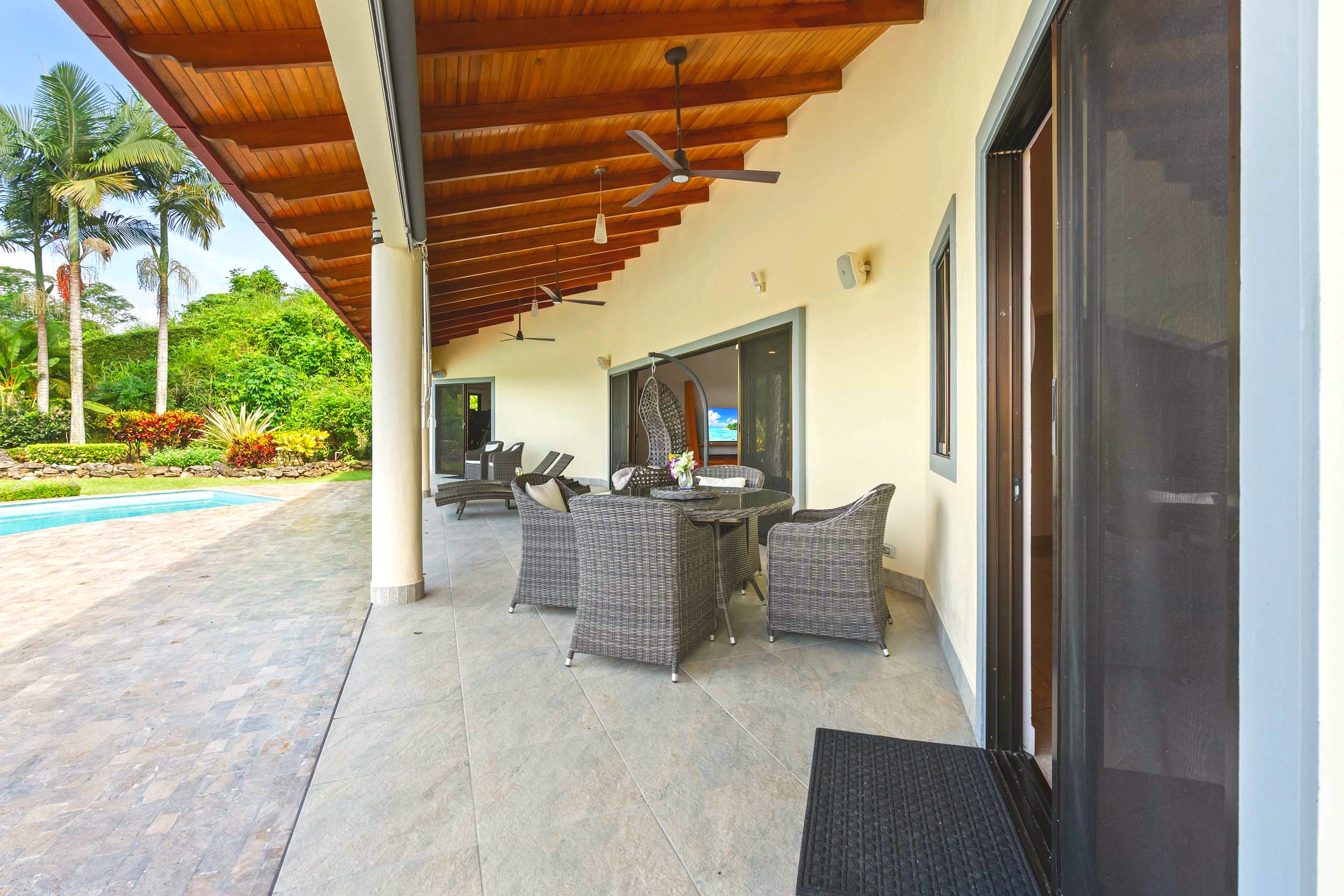 Luxurious Ocean View Home covered terrace with dining area in Chontales, Costa Rica.