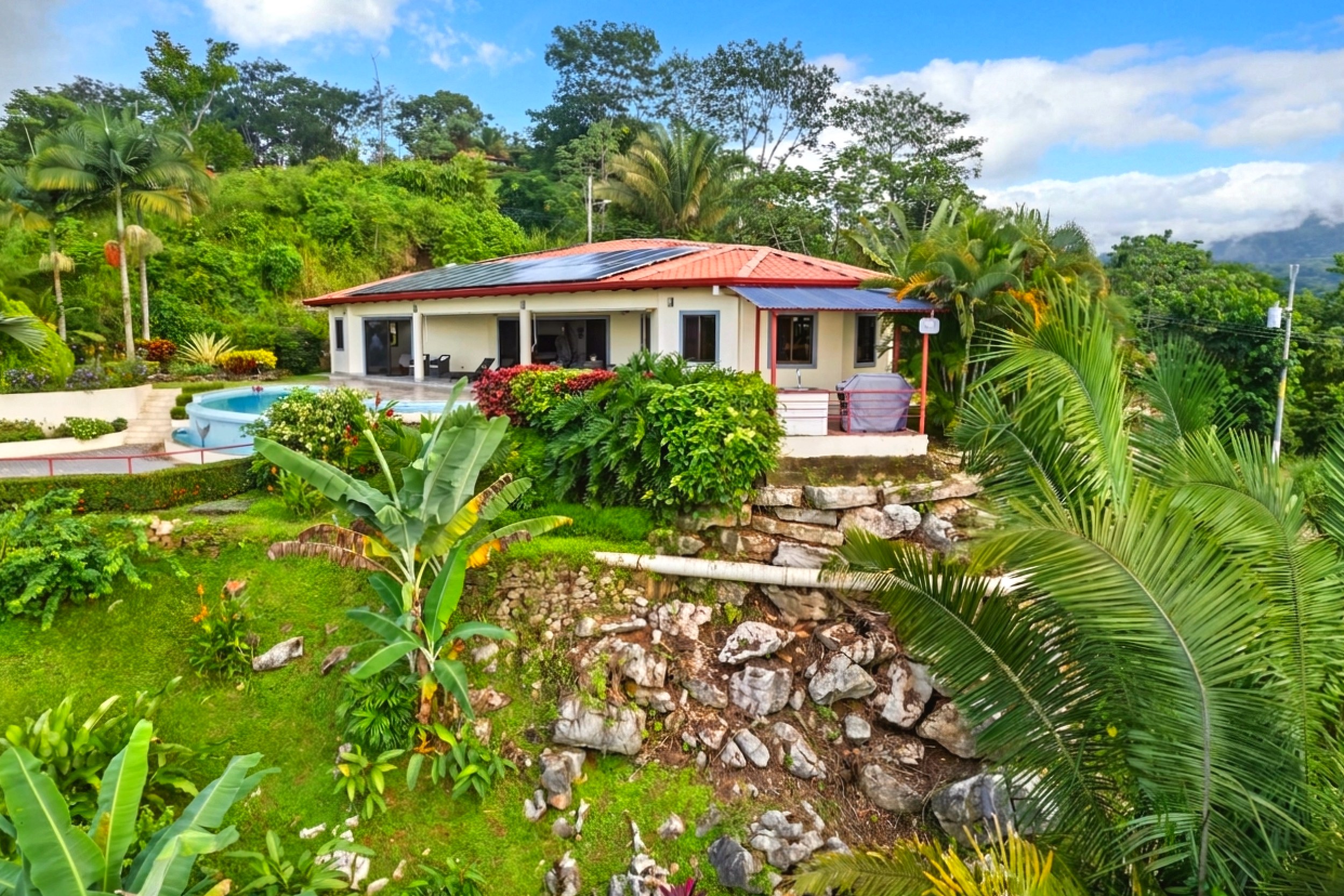 Luxurious Ocean View Home hillside exterior with pool in Chontales, Costa Rica
