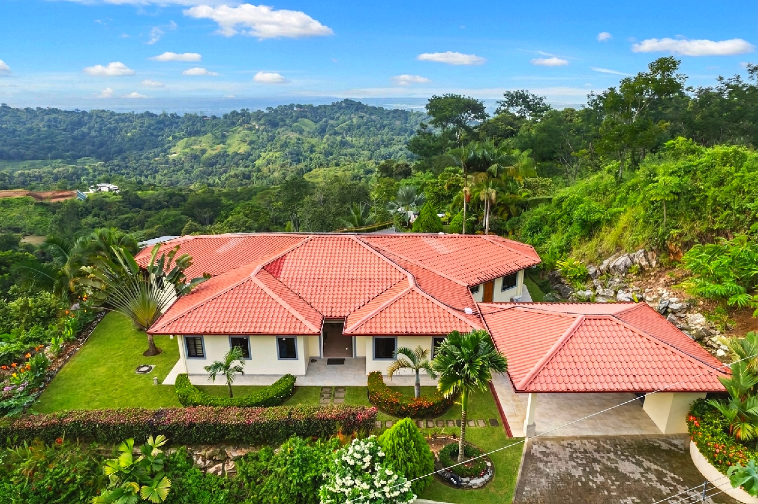 Luxurious Ocean View Home aerial view of red tiled roof villa in Chontales, Costa Rica