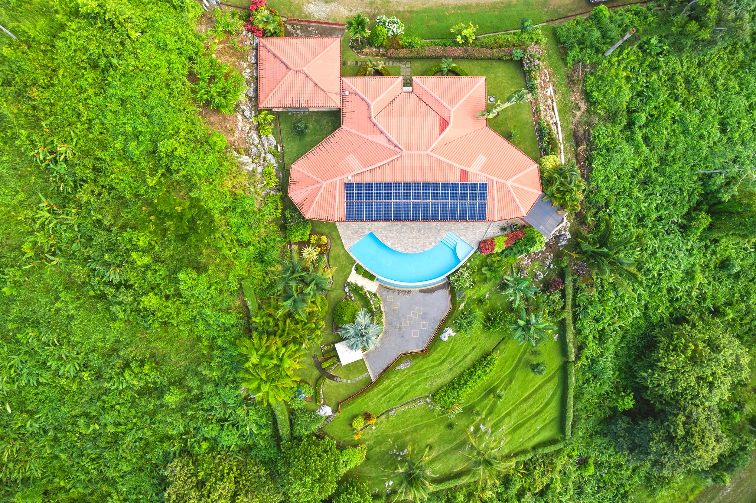 Luxurious Ocean View Home aerial view of solar panels and pool in Chontales, Costa Rica