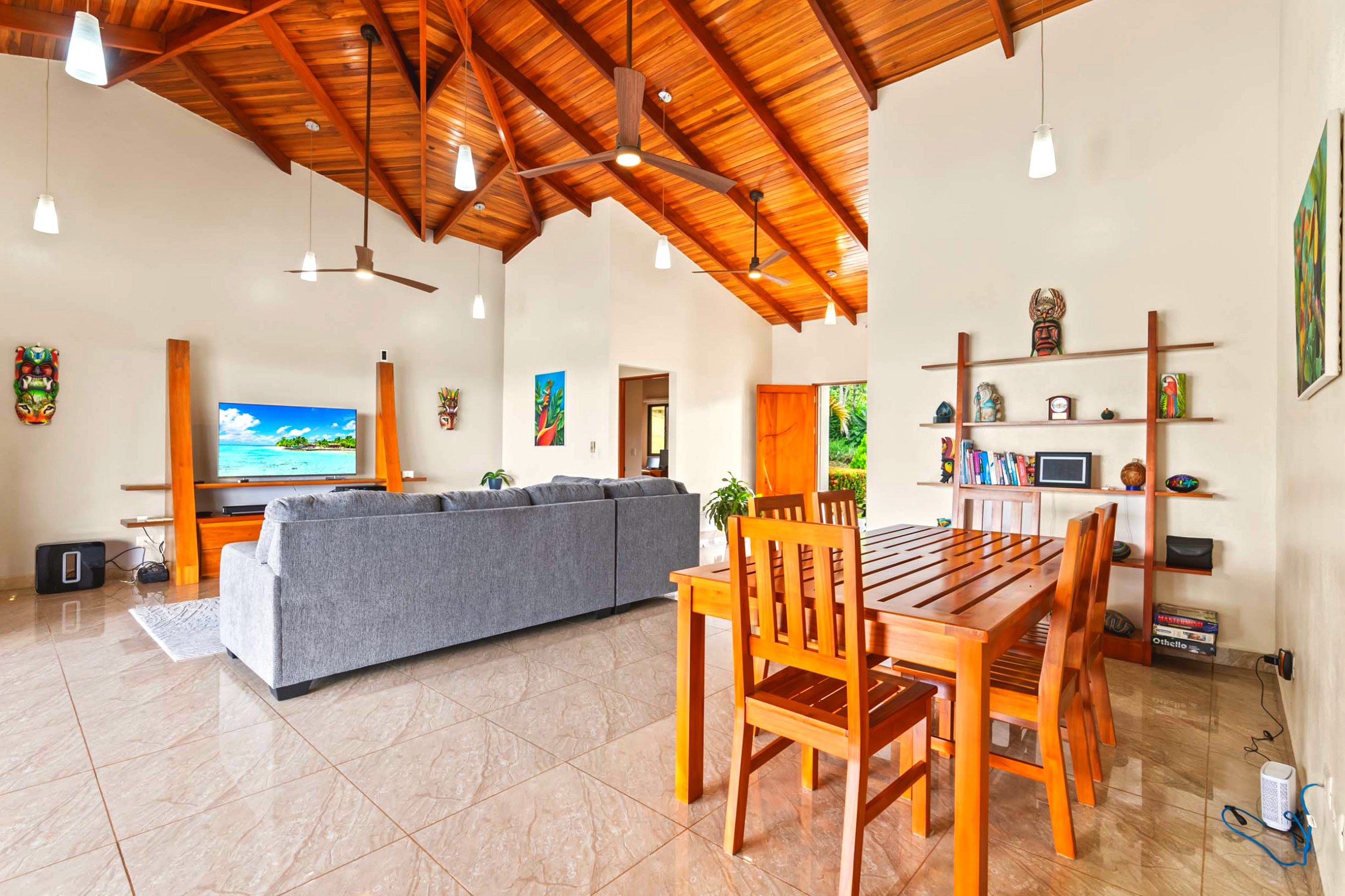 Luxurious Ocean View Home living room and dining area with wood ceiling in Chontales, Costa Rica.