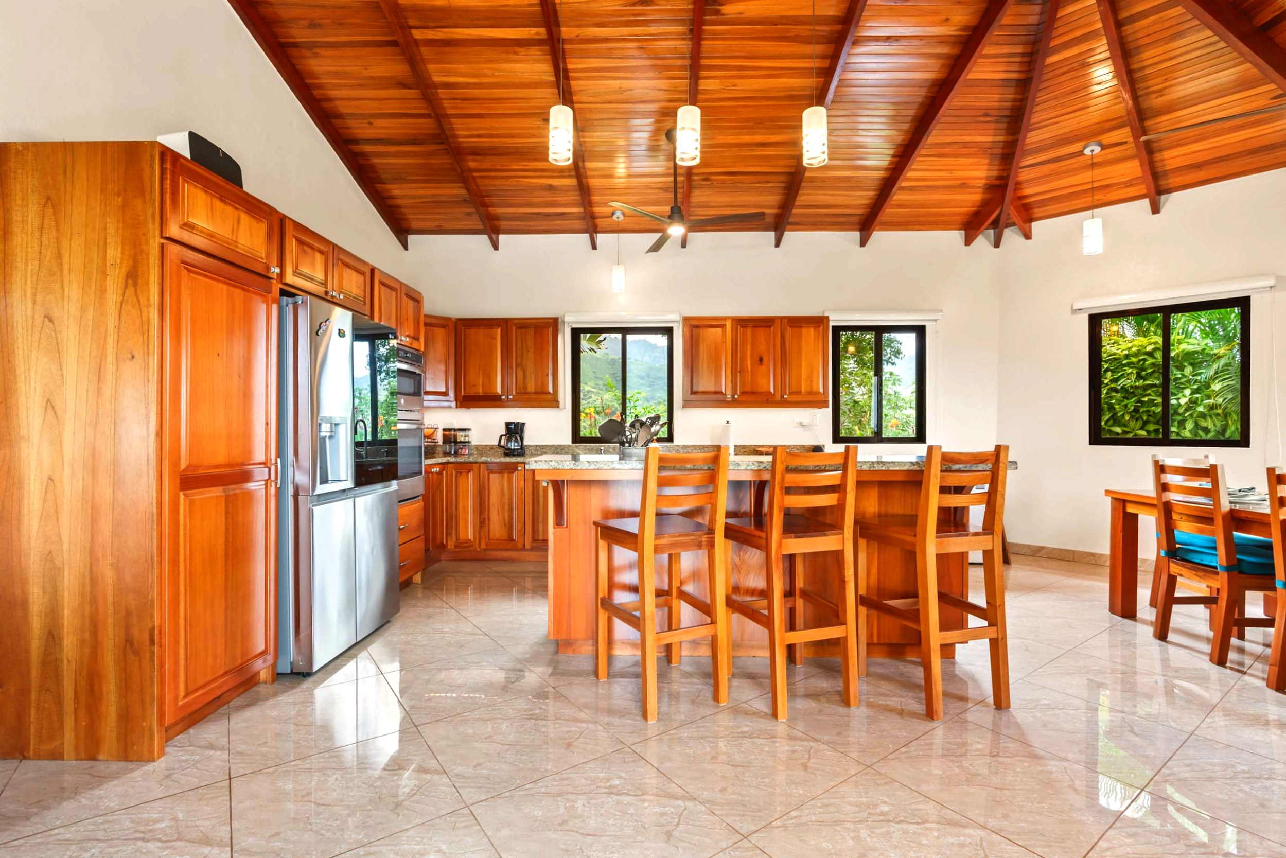 Luxurious Ocean View Home kitchen with wood ceiling and island in Chontales, Costa Rica