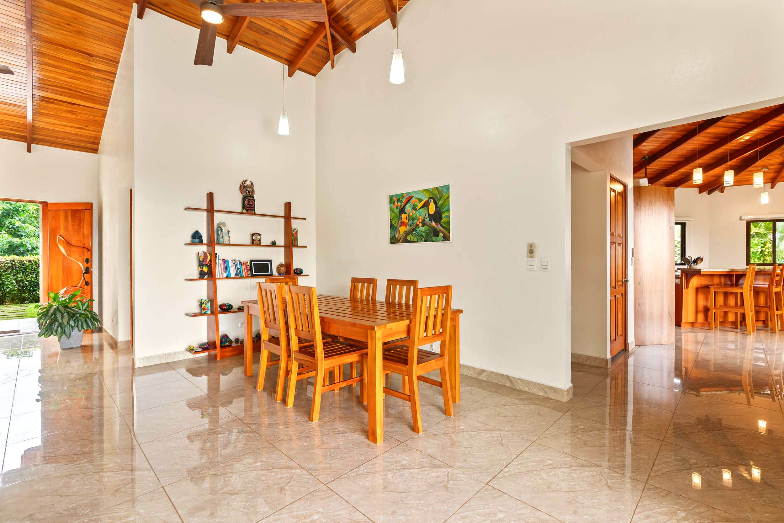 Luxurious Ocean View Home wooden dining area in Chontales, Costa Rica.