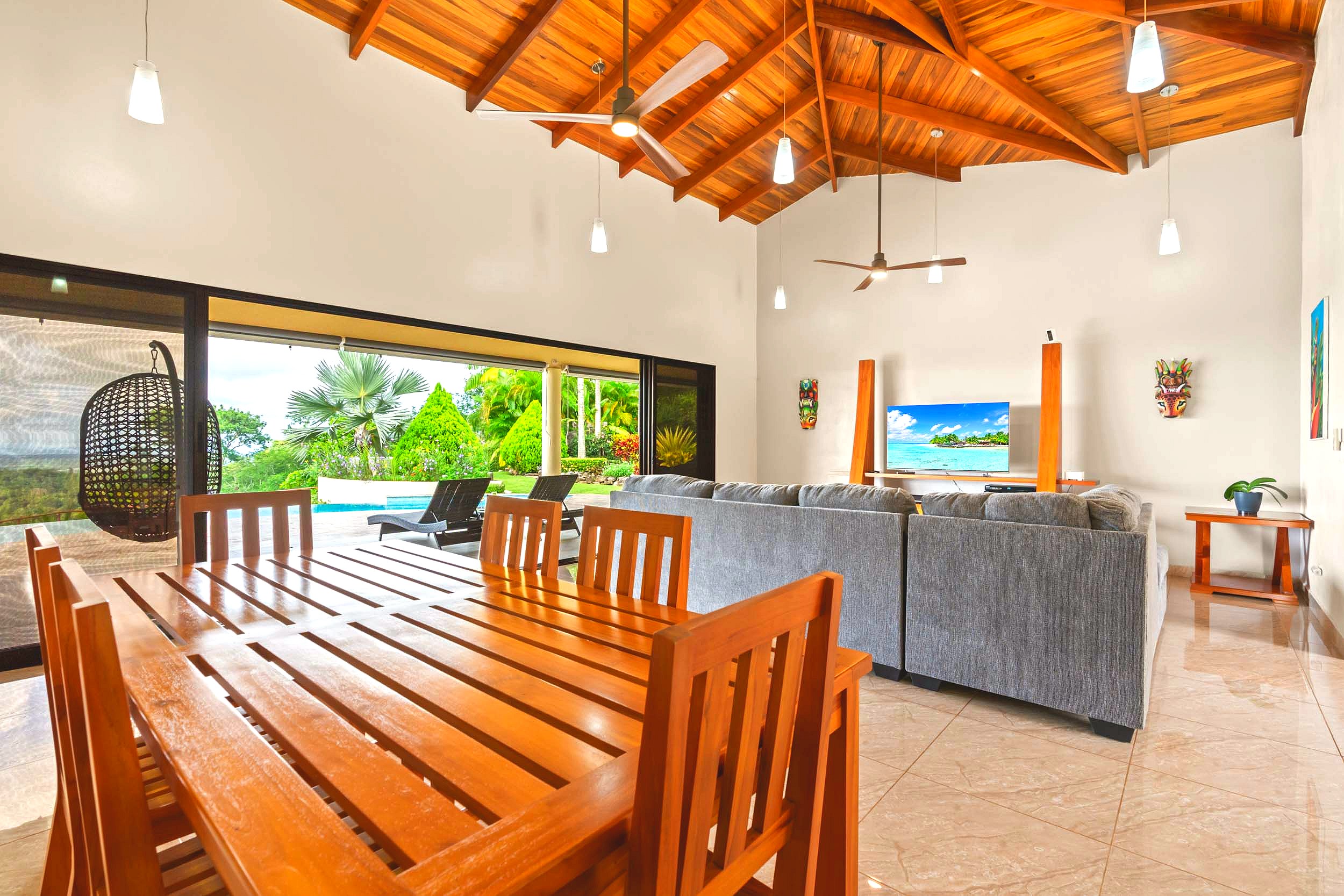 Luxurious Ocean View Home wooden dining table and vaulted wood ceiling in Chontales, Costa Rica
