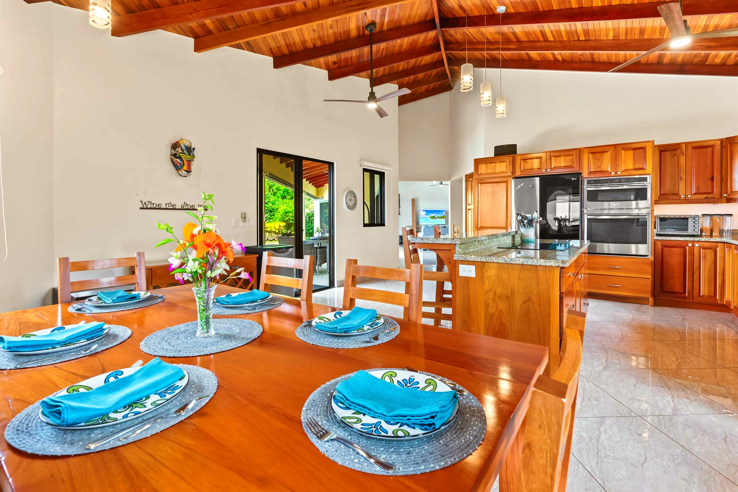 Luxurious Ocean View Home wood dining table and kitchen in Chontales, Costa Rica.