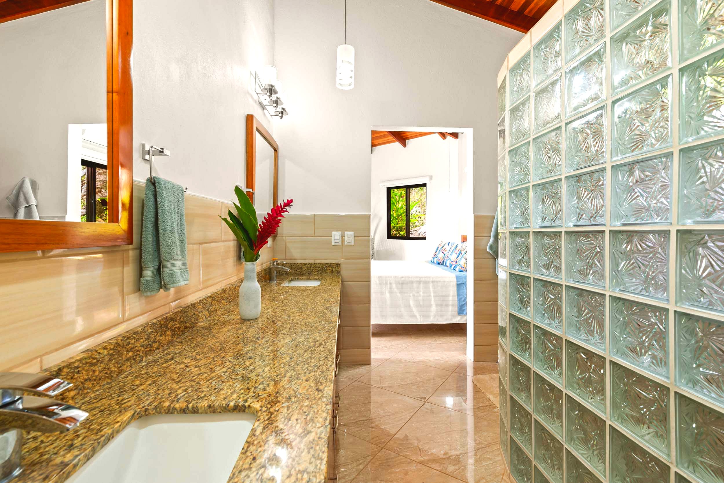 Luxurious Ocean View Home master bathroom vanity and glass block wall in Chontales, Costa Rica