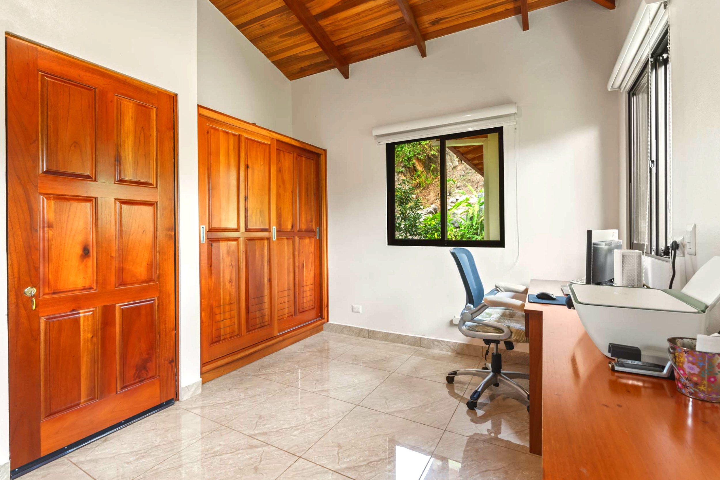 Luxurious Ocean View Home office desk and built-in closet in Chontales, Costa Rica.