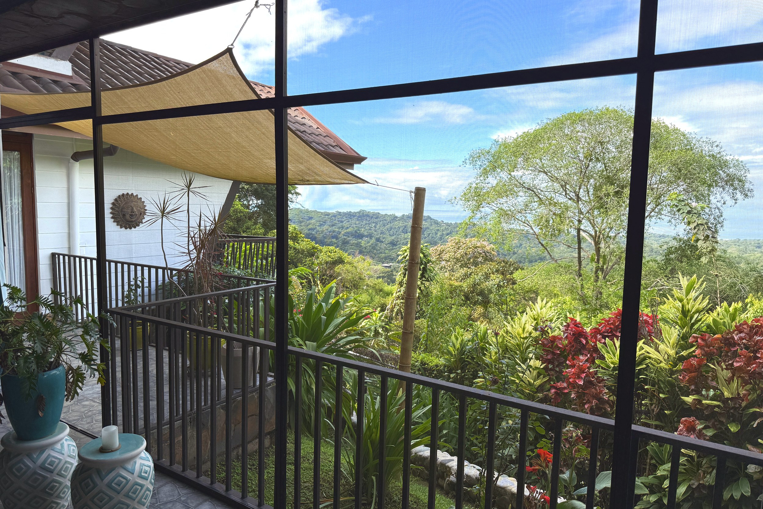 Screened Terrace & Jungle View Panoramic Ocean View Home screened terrace with jungle & ocean views in Ojochal, Costa Rica