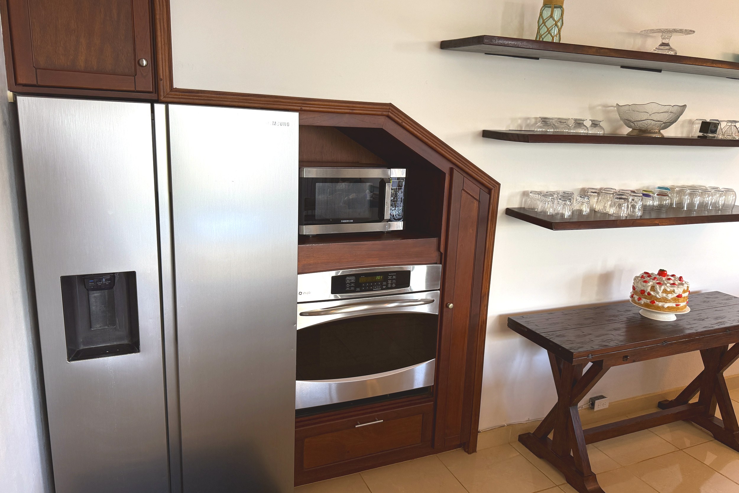Kitchen Appliance Nook Ocean View Home stainless fridge, built-in microwave & oven in Ojochal, Costa Rica