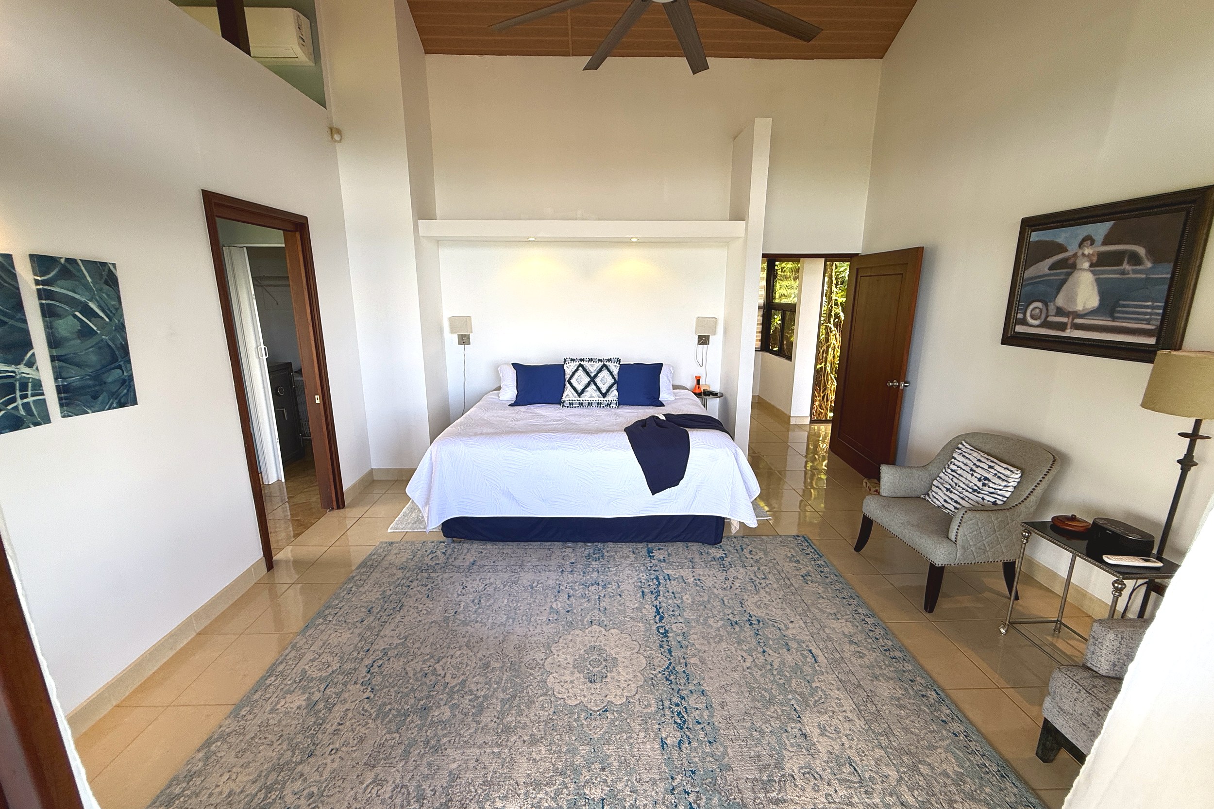 Spacious Master Bedroom Suite Ocean View Home master bedroom with vaulted ceiling and rug in Ojochal, Costa Rica