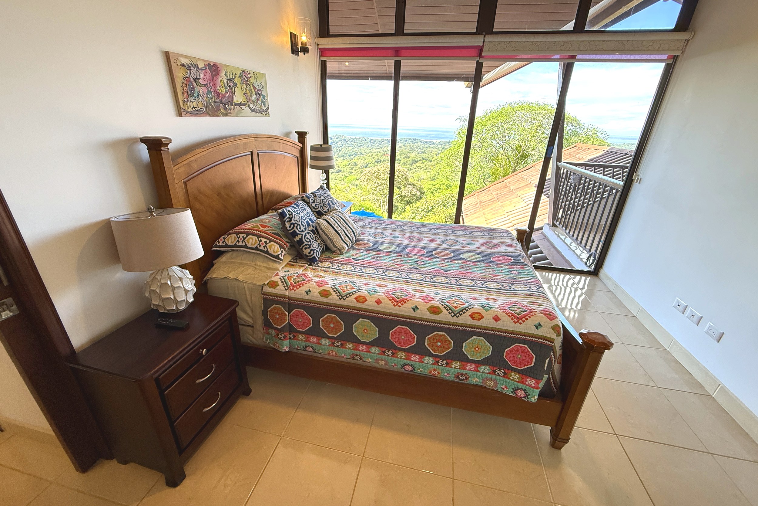 Guest Bedroom with Ocean View Panoramic Ocean View Home guest bedroom with balcony and ocean view in Ojochal, Costa Rica