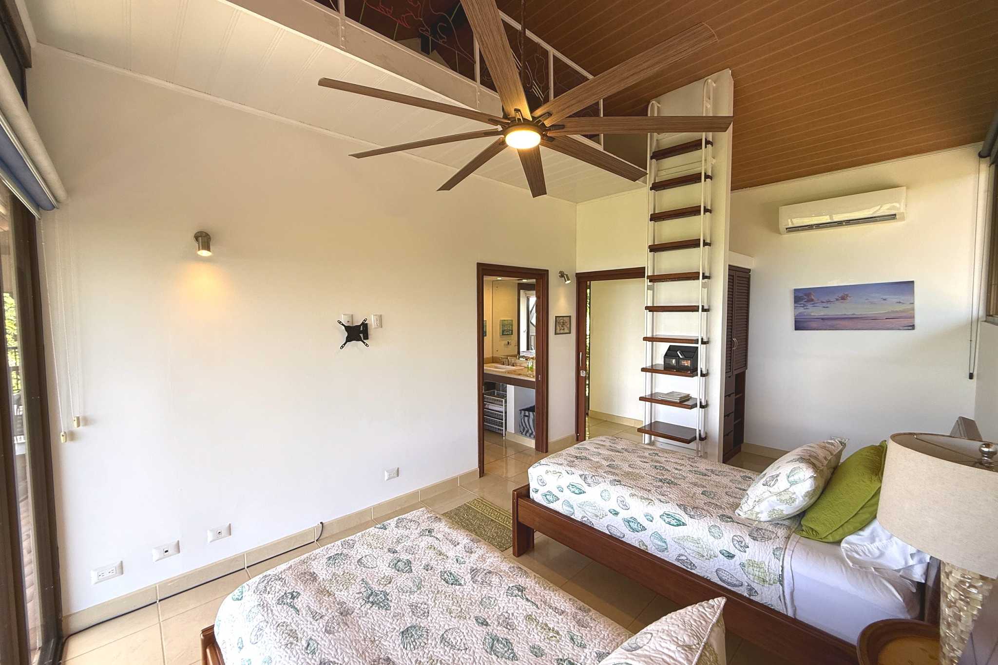 Panoramic Ocean View Home twin beds with loft ladder & ceiling fan in Ojochal, Costa Rica