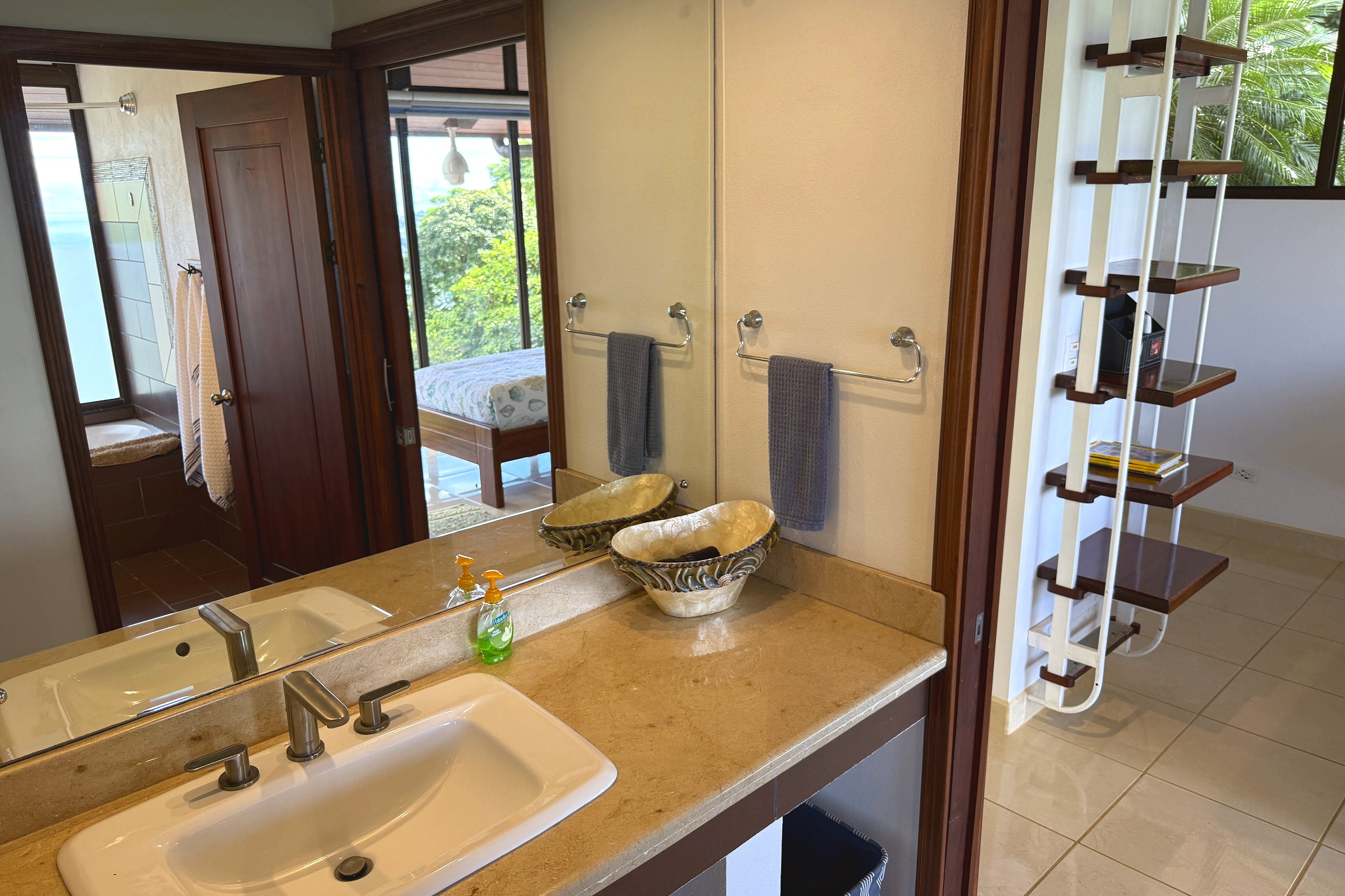Guest Bathroom Vanity Ocean View Home guest bathroom with vessel sink & wooden shelving in Ojochal, Costa Rica