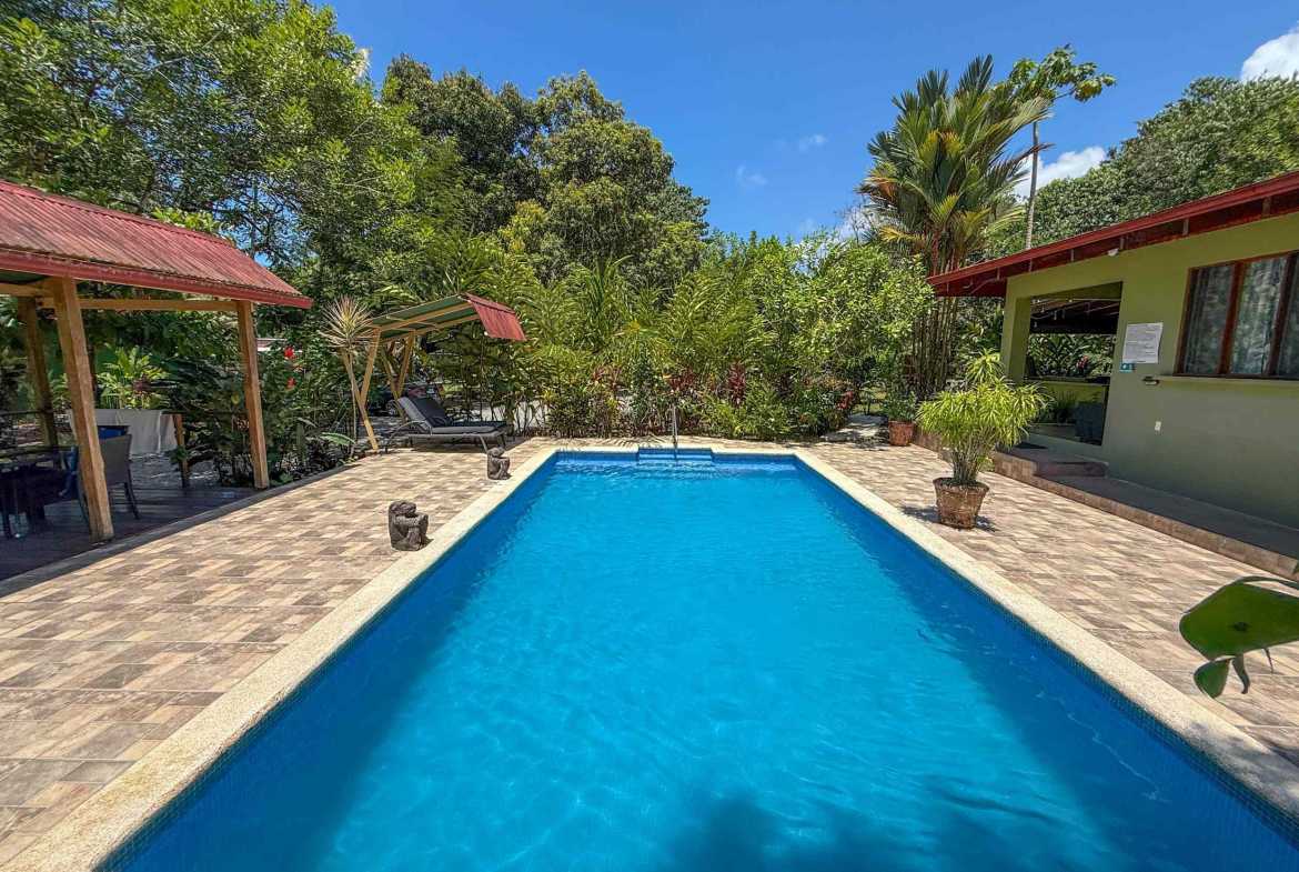Gorgeous Jungle Hotel with 11 Beds including Owner/Manager Unit, Sparkling Pool & River Setting in Ojochal Costa Rica